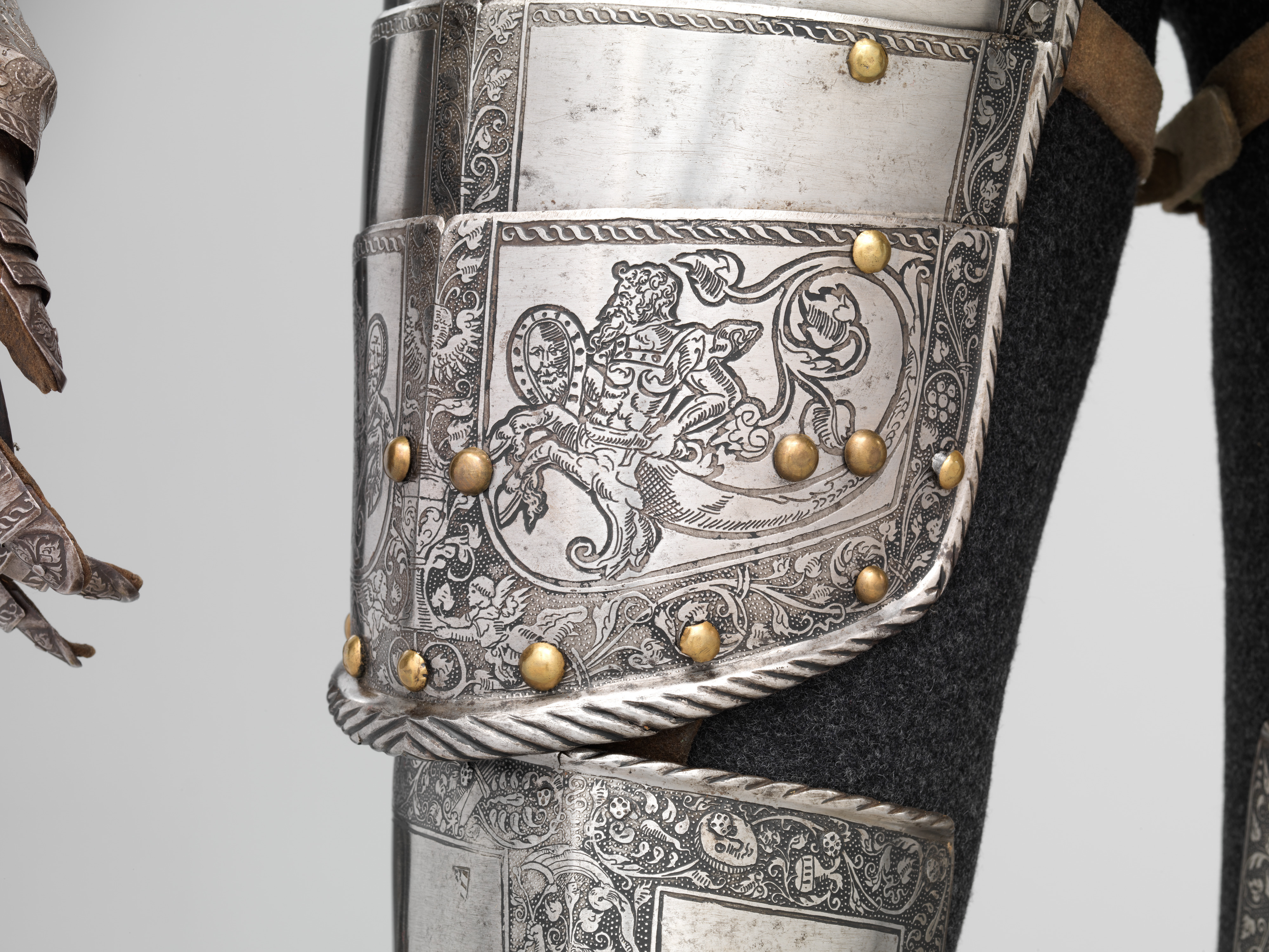 Detail of triton in etched decoration