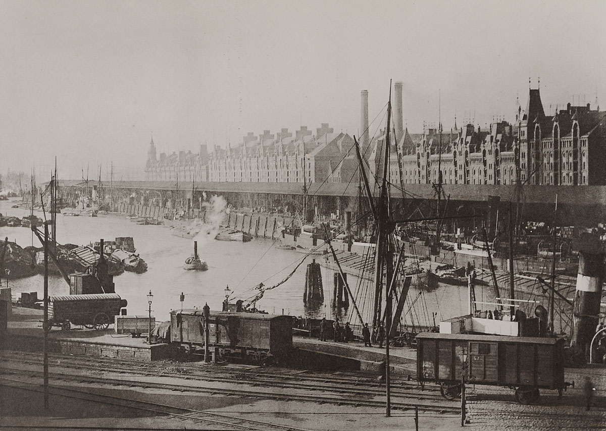 The Sandtorhafen and the warehouse blocks of the Speicherstadt, the bonded warehouse district of the Hamburg free port, photographed by Georg Koppmann about 1894.