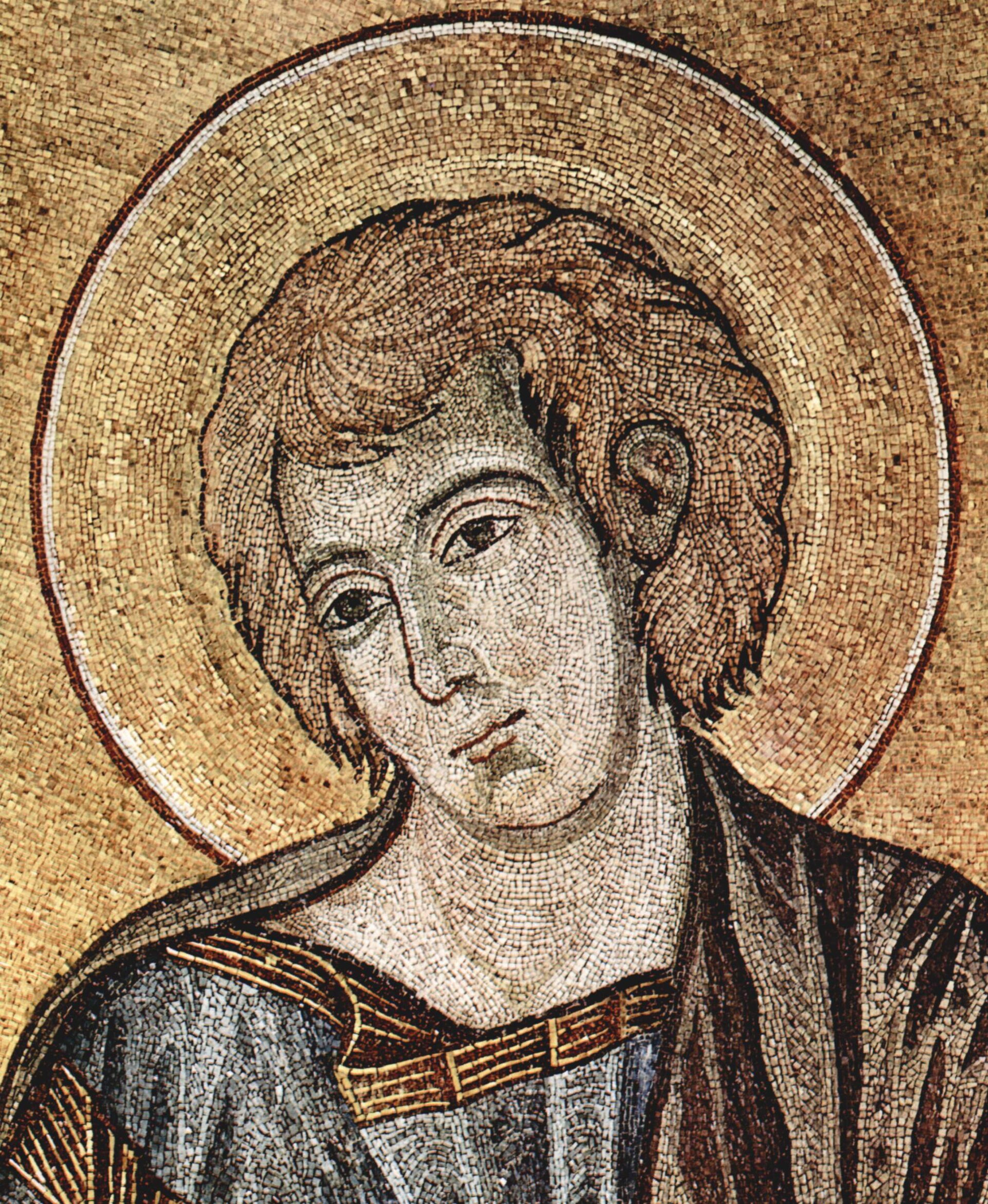 Head of Saint John the Evangelist, detail of the apse mosaic of Pisa Cathedral, set in glass and stone tesserae. The cathedral's fabric accounts paid Cimabue ten soldi a day from 2 September 1301 to 19 February 1302, ninety-four days in all, and specify that he finished this figure; only the Saint John in that mosaic is his, and it is the sole surviving work documented as his in his own lifetime. It is also not a painting, so the single fixed point in the corpus sits in a medium the disputed panels are not. Everything else given to him rests on argument, including the Louvre's Mocking of Christ, which this publication records as attributed on infrared examination of the underdrawing and on woodworm tunnels matching two other panels of the same dismembered object; nothing in the corpus is signed.