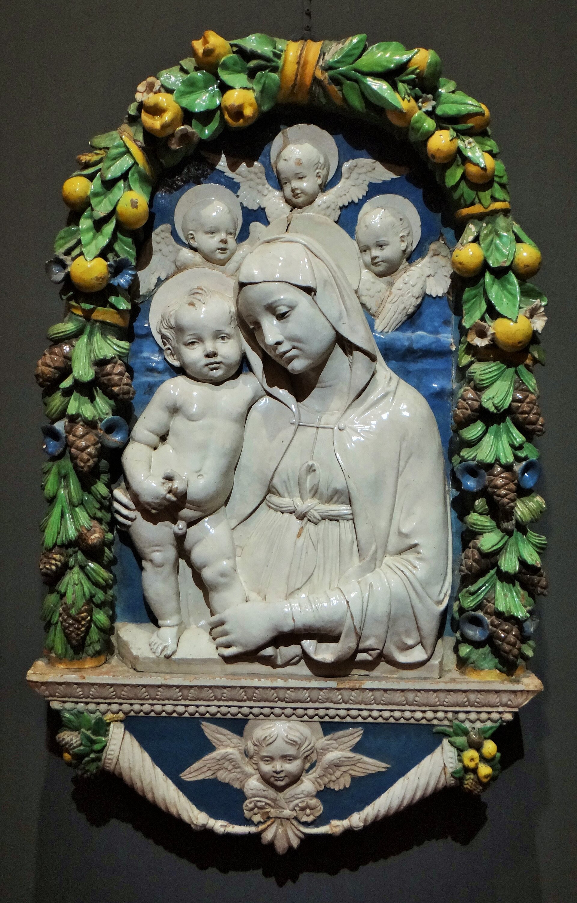 Madonna with Child and three cherubs, attributed to Andrea della Robbia