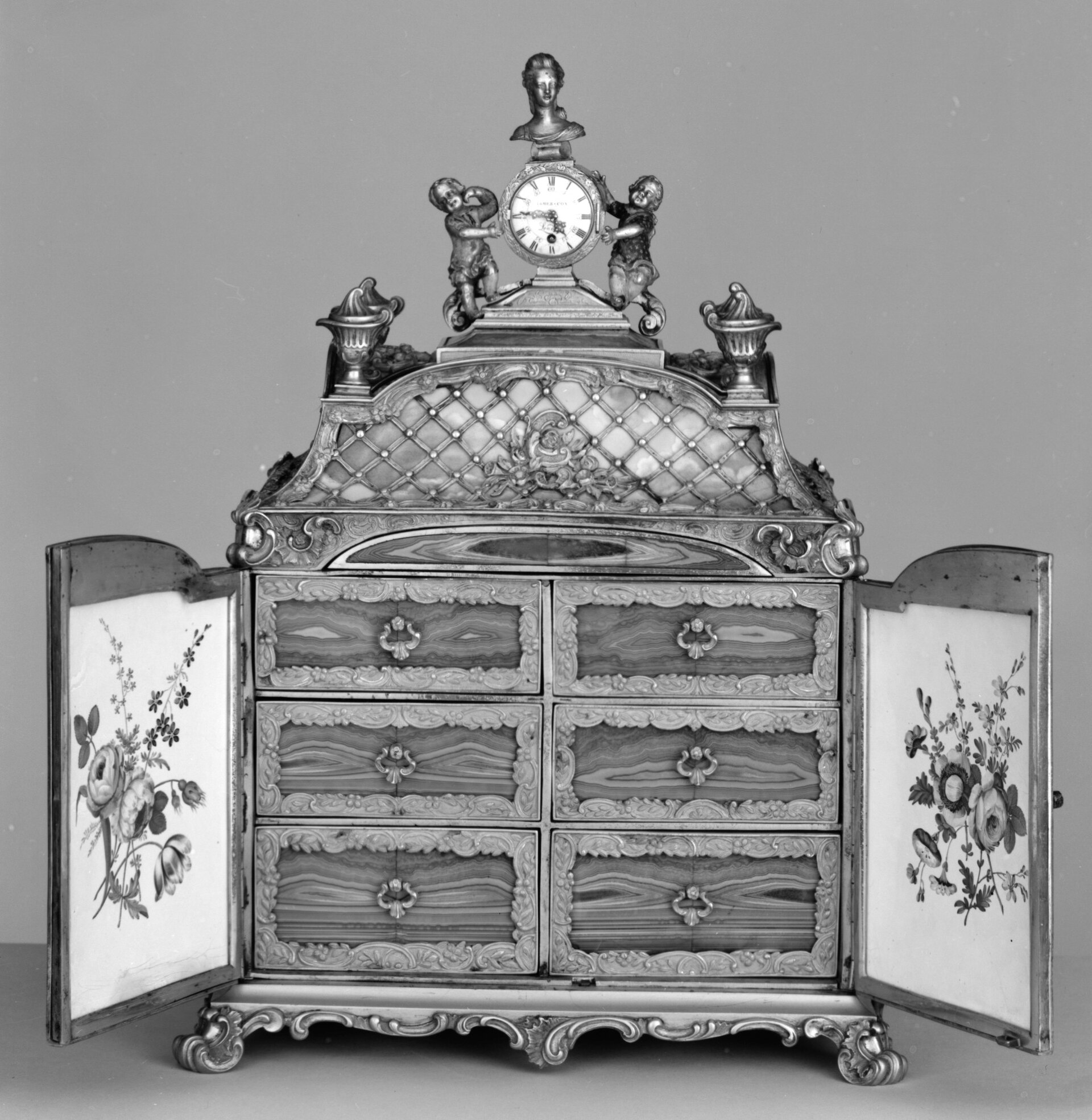 Jewel cabinet with watch