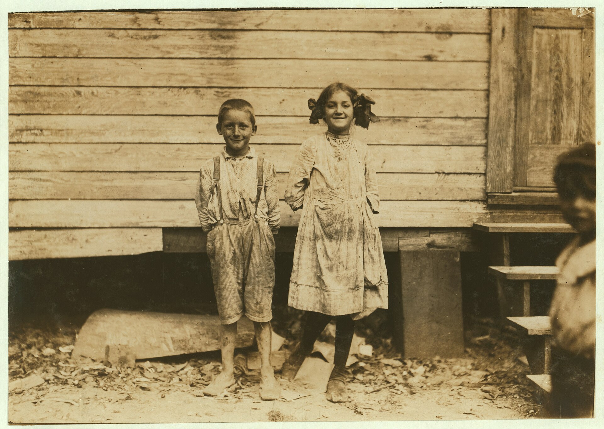 Carrie Dietrick, ten years old, and Raymond, seven years old, pick shrimp at the Peerless Oyster Company