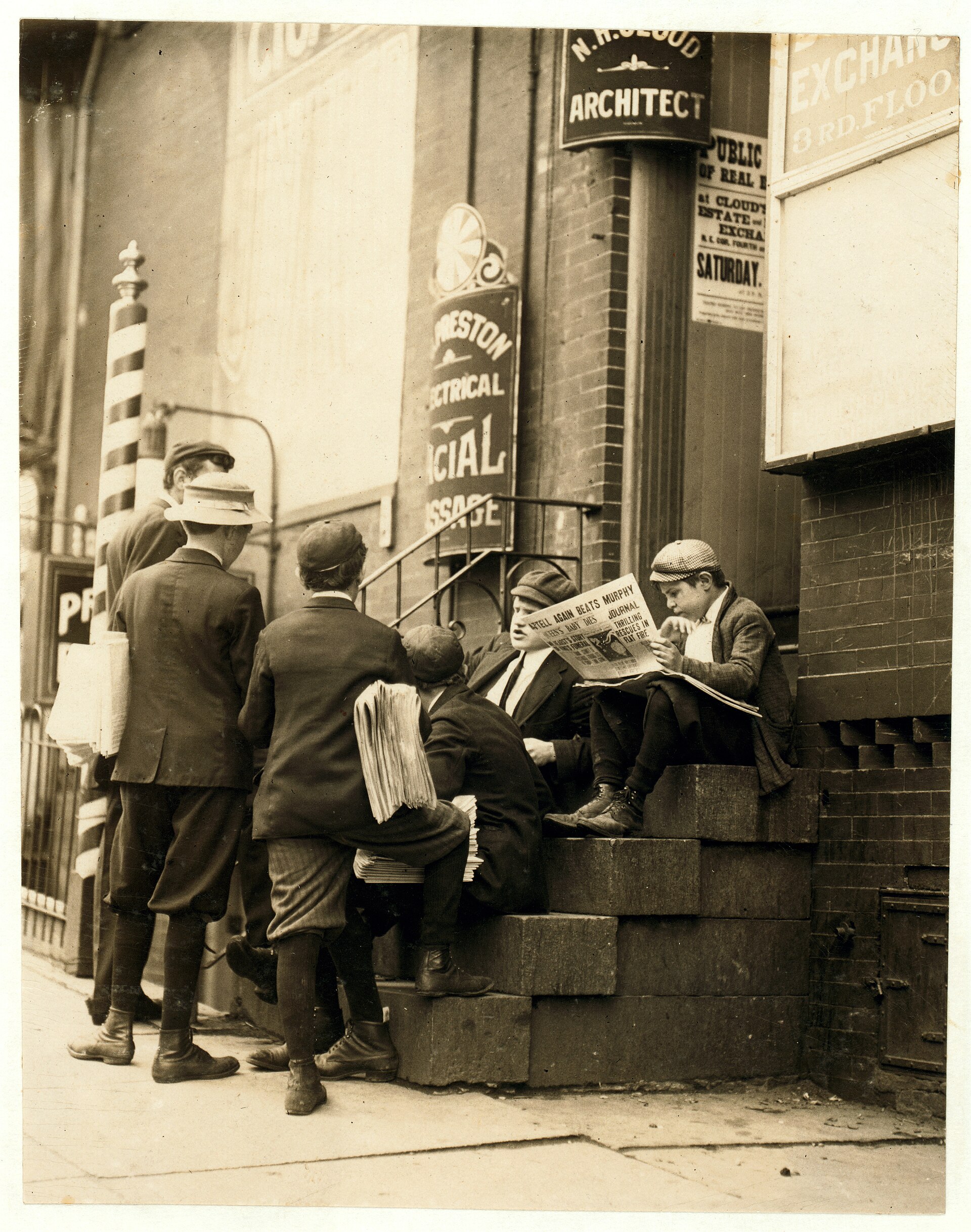 Newsboys on a stoop, Wilmington, Delaware