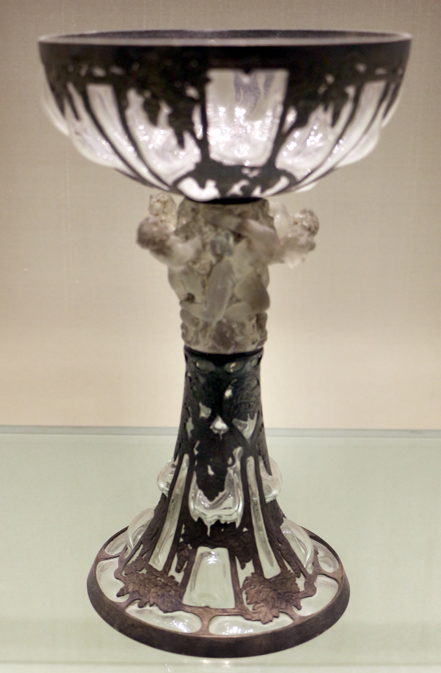 Vase with figures and tendrils