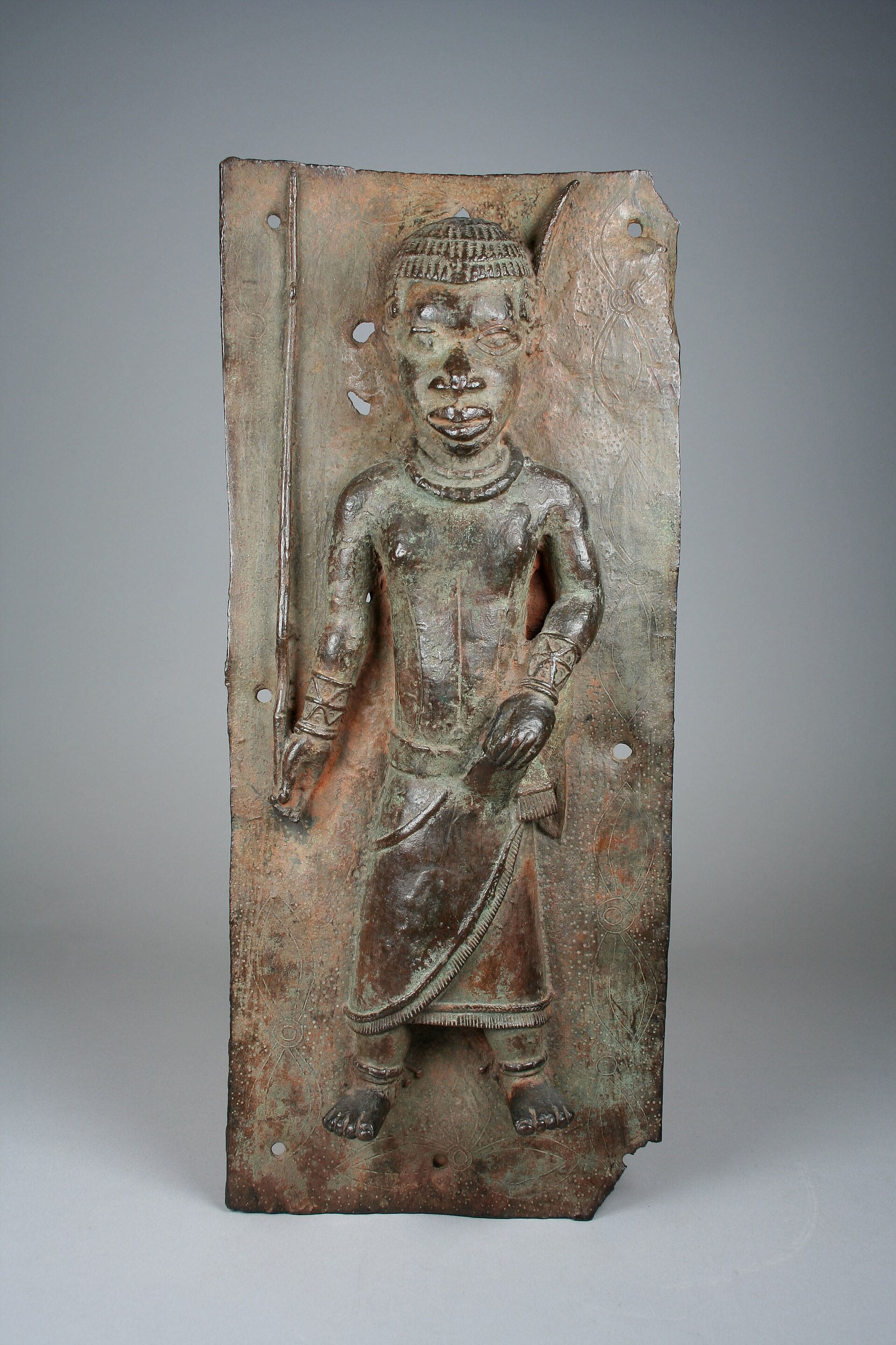Plaque with court official with magical staff, Metropolitan Museum 1991.17.22