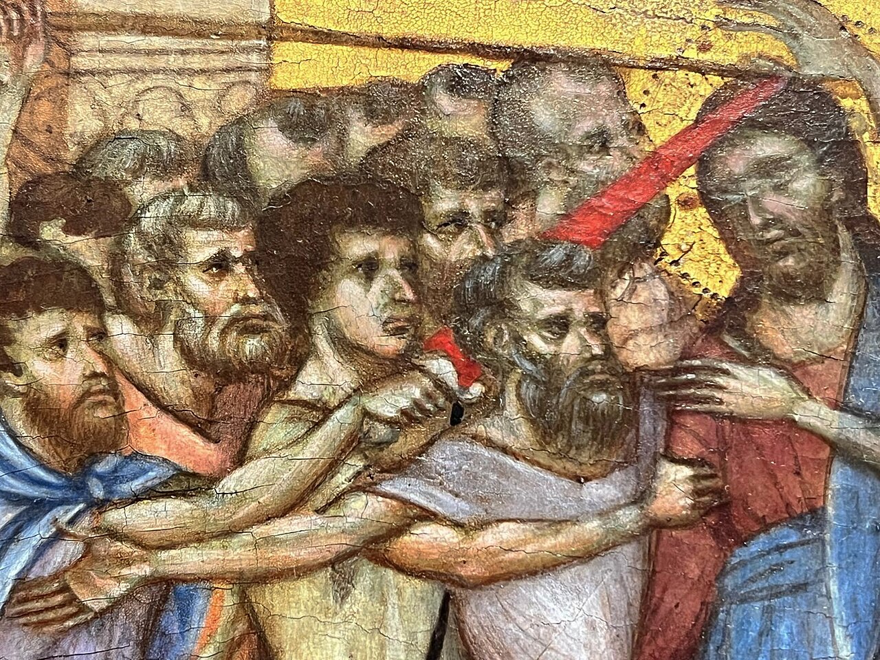 Detail of Cimabue's Mocking of Christ showing the faces of the tormentors