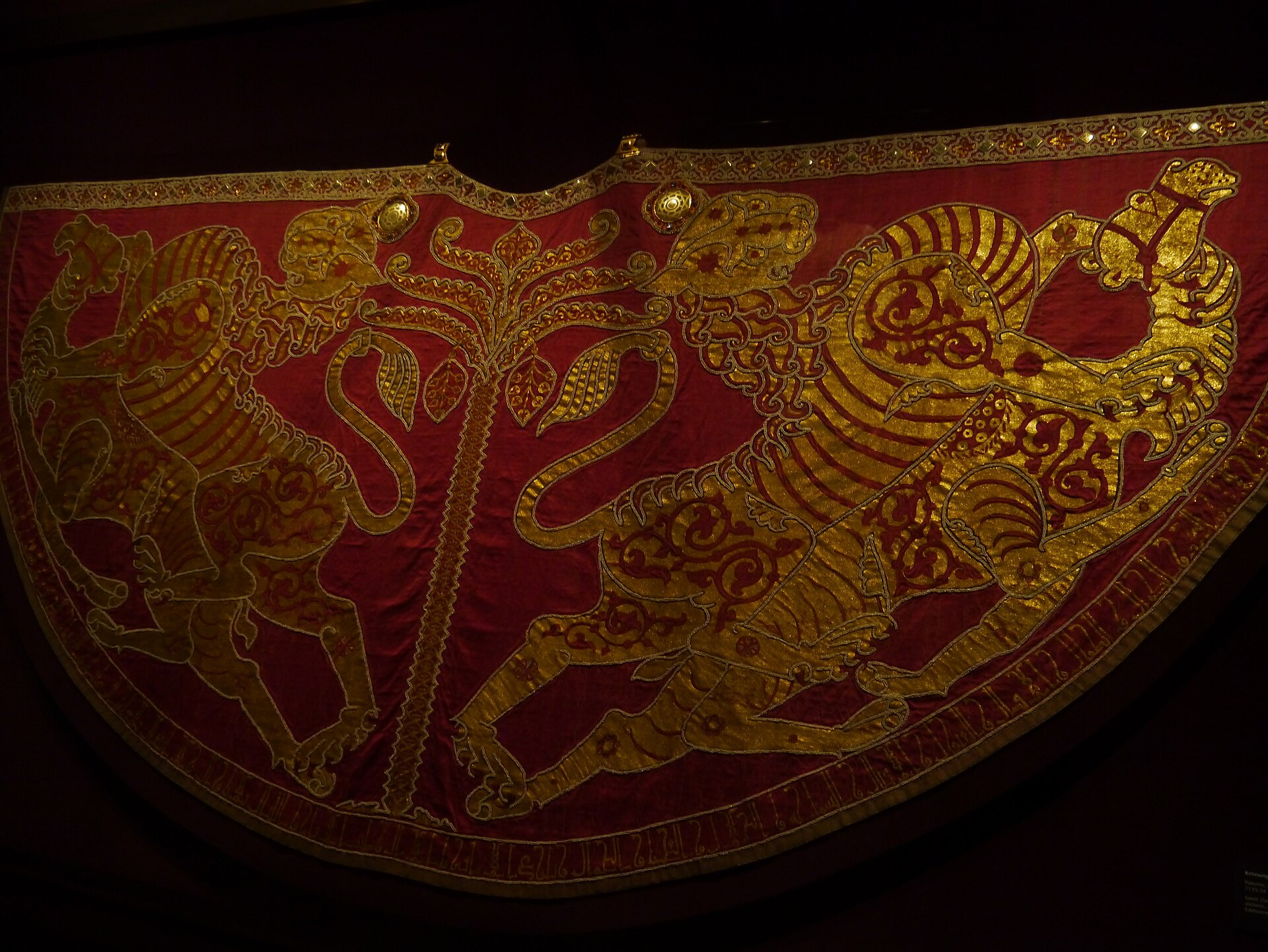 The mantle in its display case