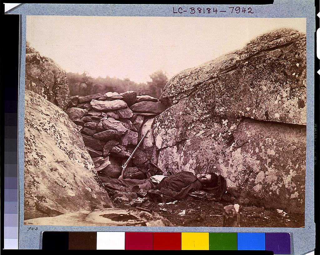 Battle-field of Gettysburg--Dead Confederate sharpshooter at foot of Little Round Top [i.e., Devil's Den]