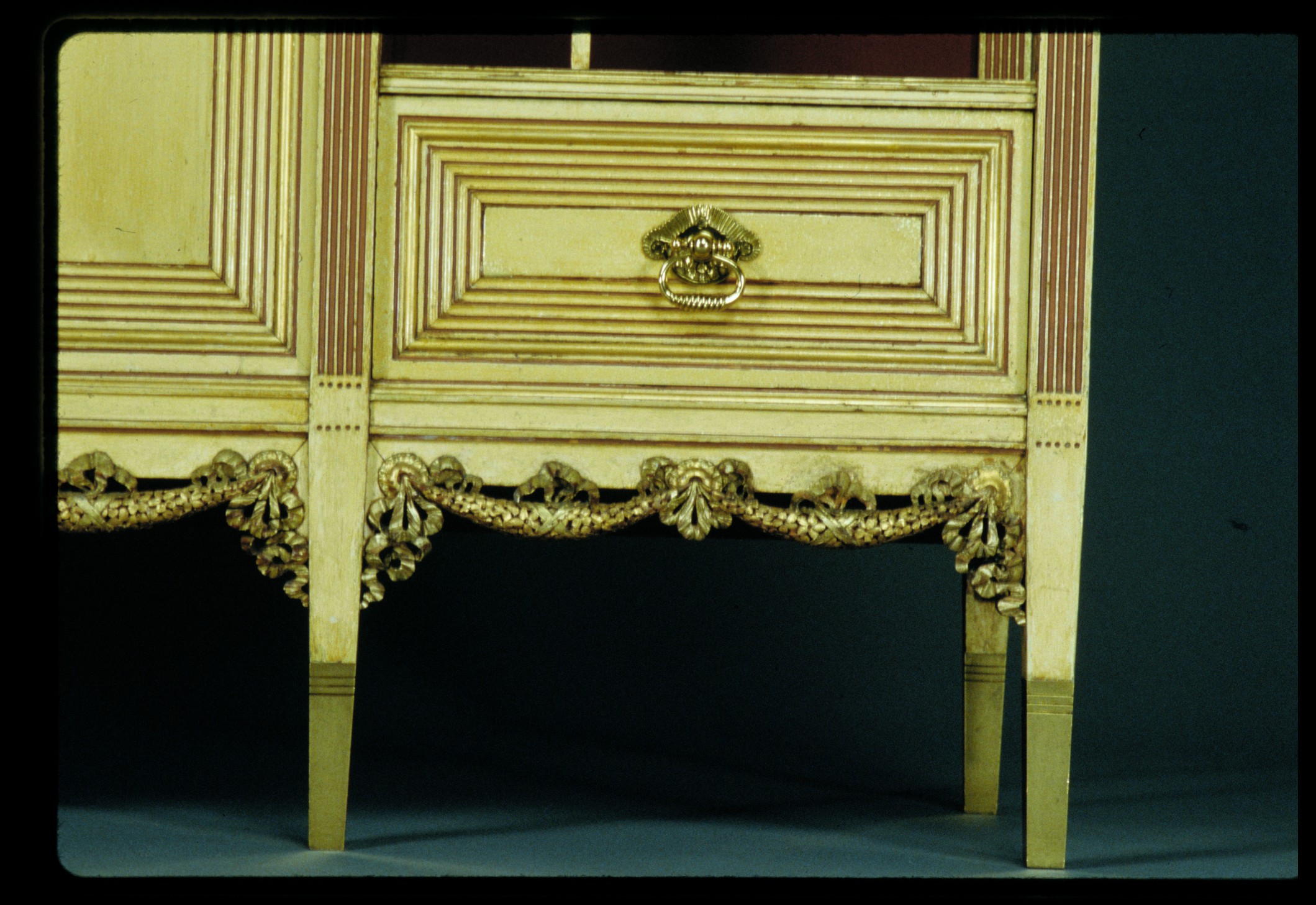 Cabinet, detail of a drawer and apron