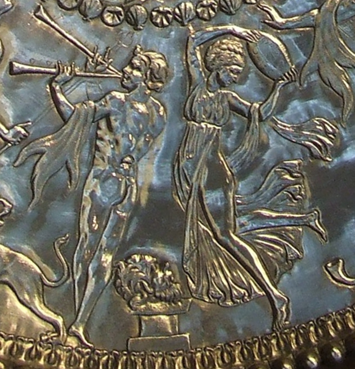 Detail: aulos and tambourine