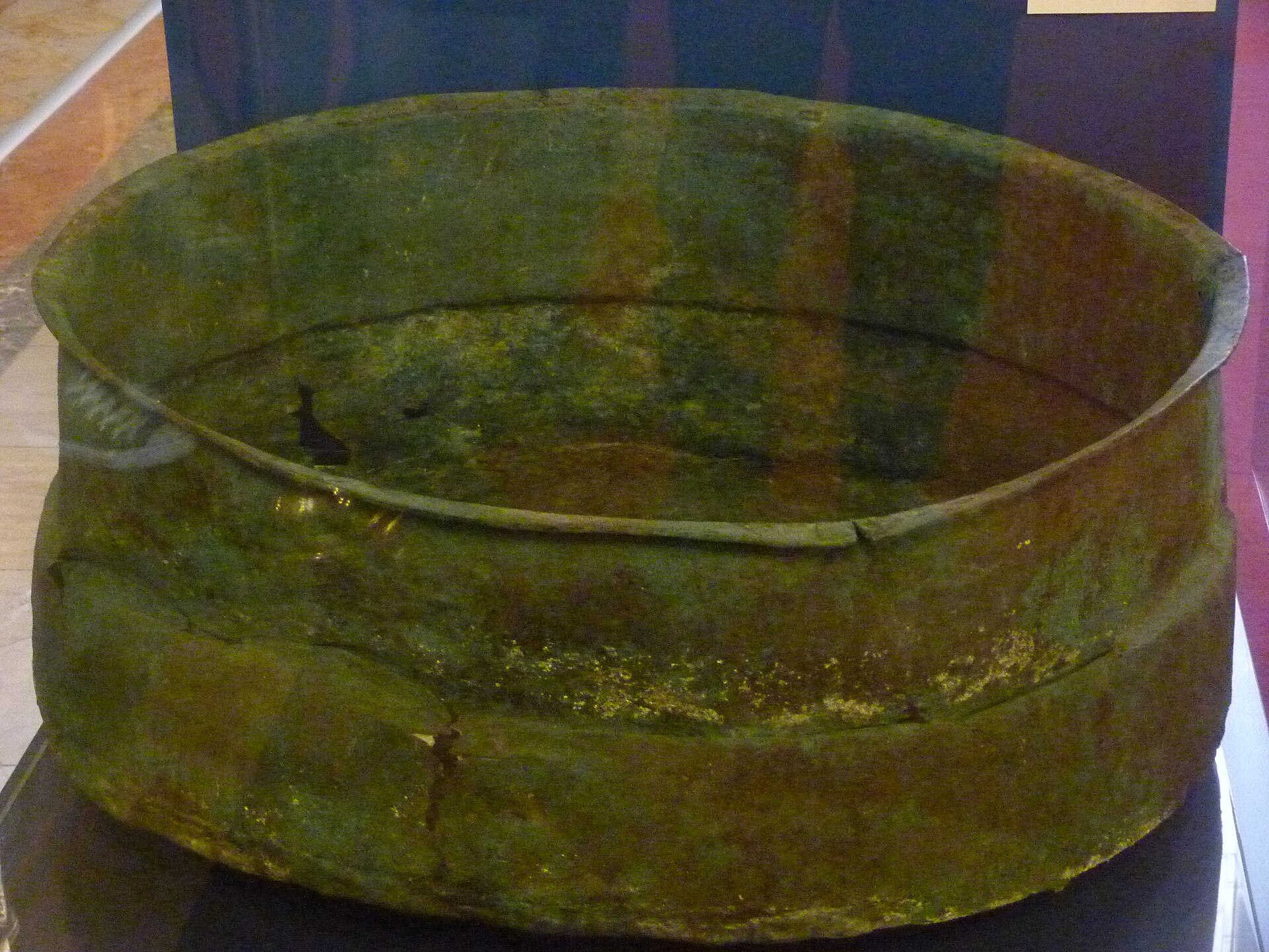 The copper alloy cauldron in which the silver was buried