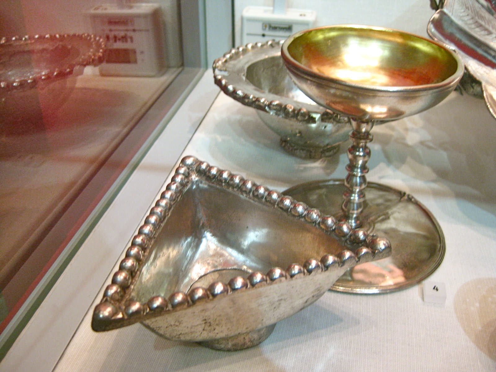 Silver cup and triangular dish from the Traprain Law Treasure