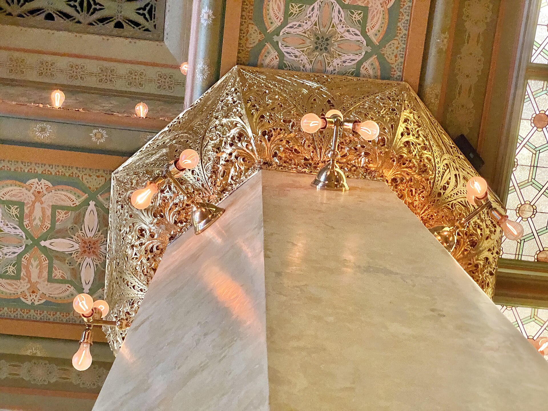 Gilded Sullivan ornament and stained glass inside the reconstructed Trading Room