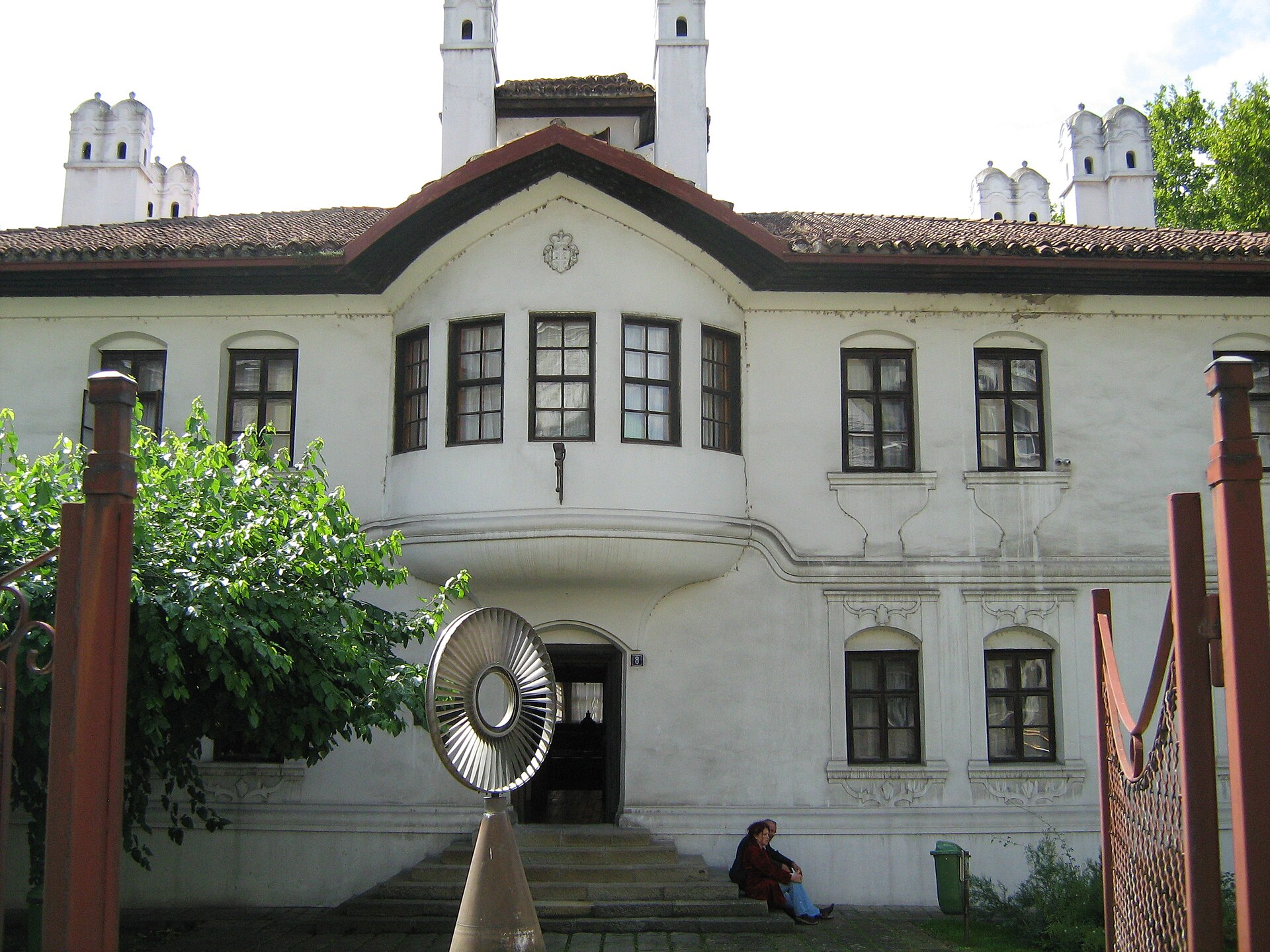 The entrance facade and bay window