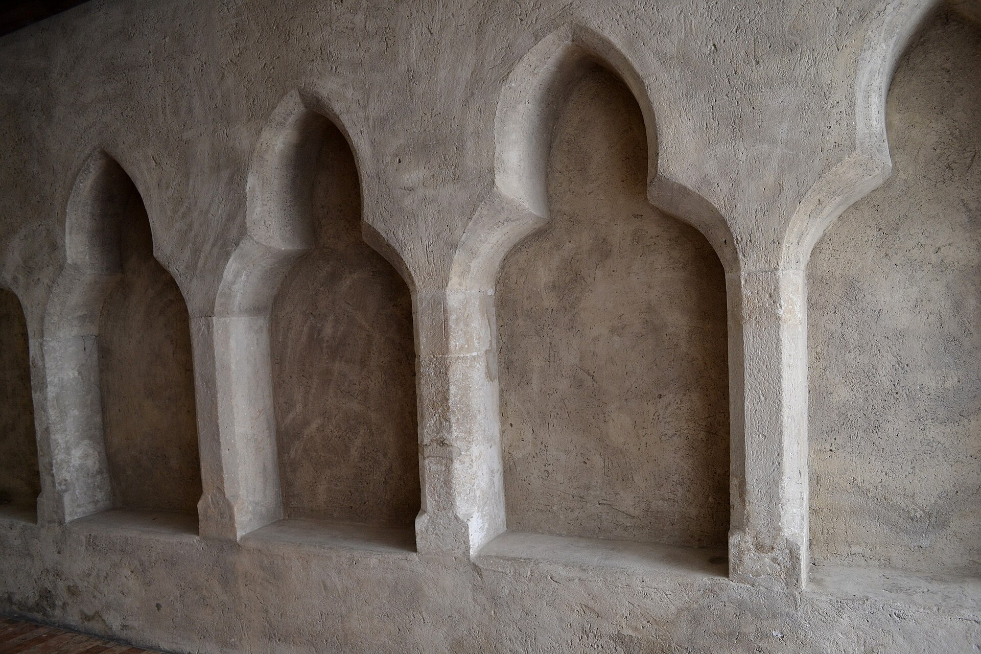 Stone seating (sedilia) inside the Gothic core of Palffy Palace
