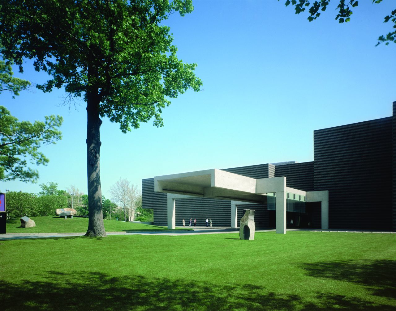 The banded granite wing of 1971 and the concrete canopy over the north entrance