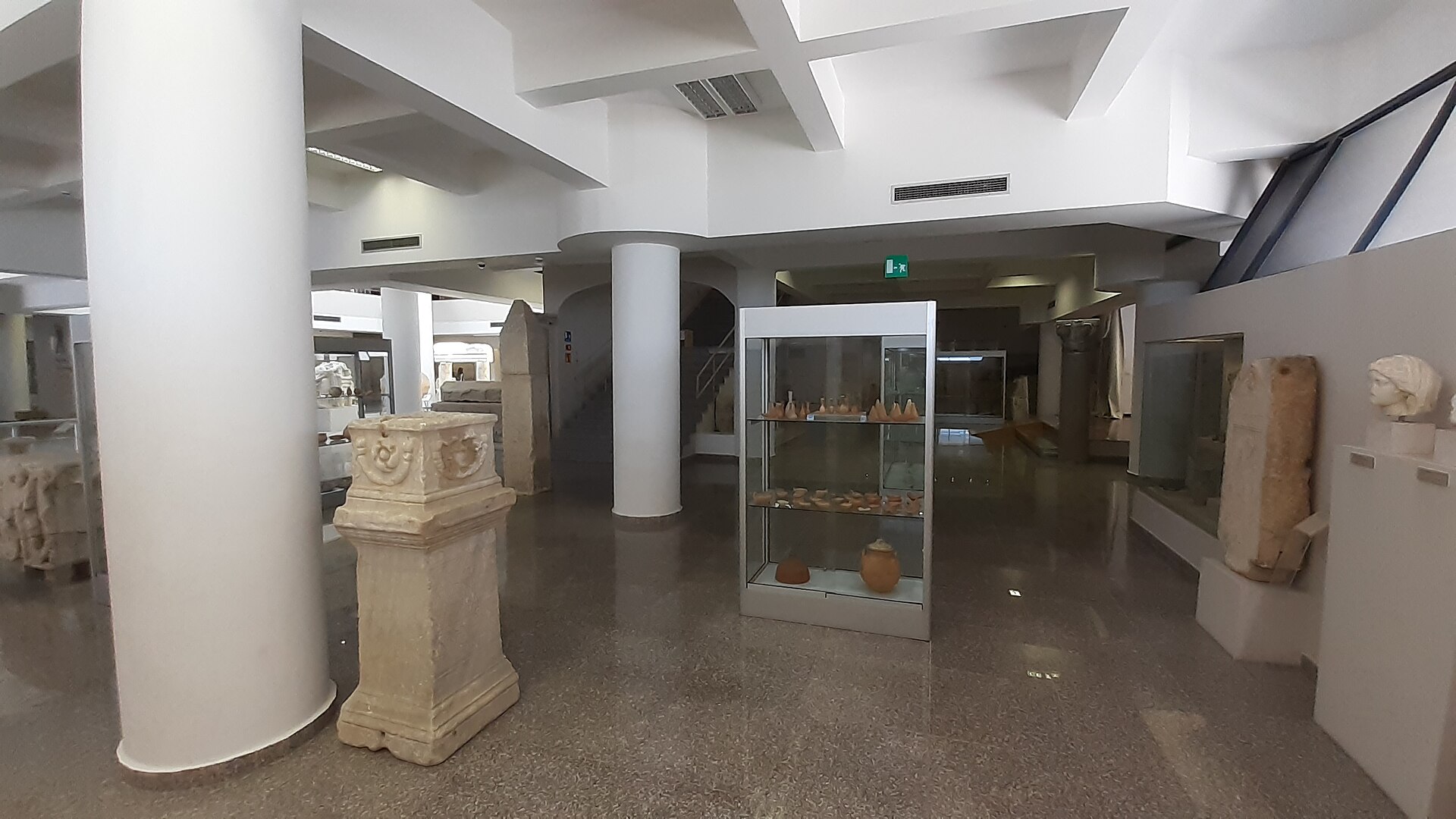 Ground floor entrance hall with stone stelae, sarcophagi and portrait busts on display
