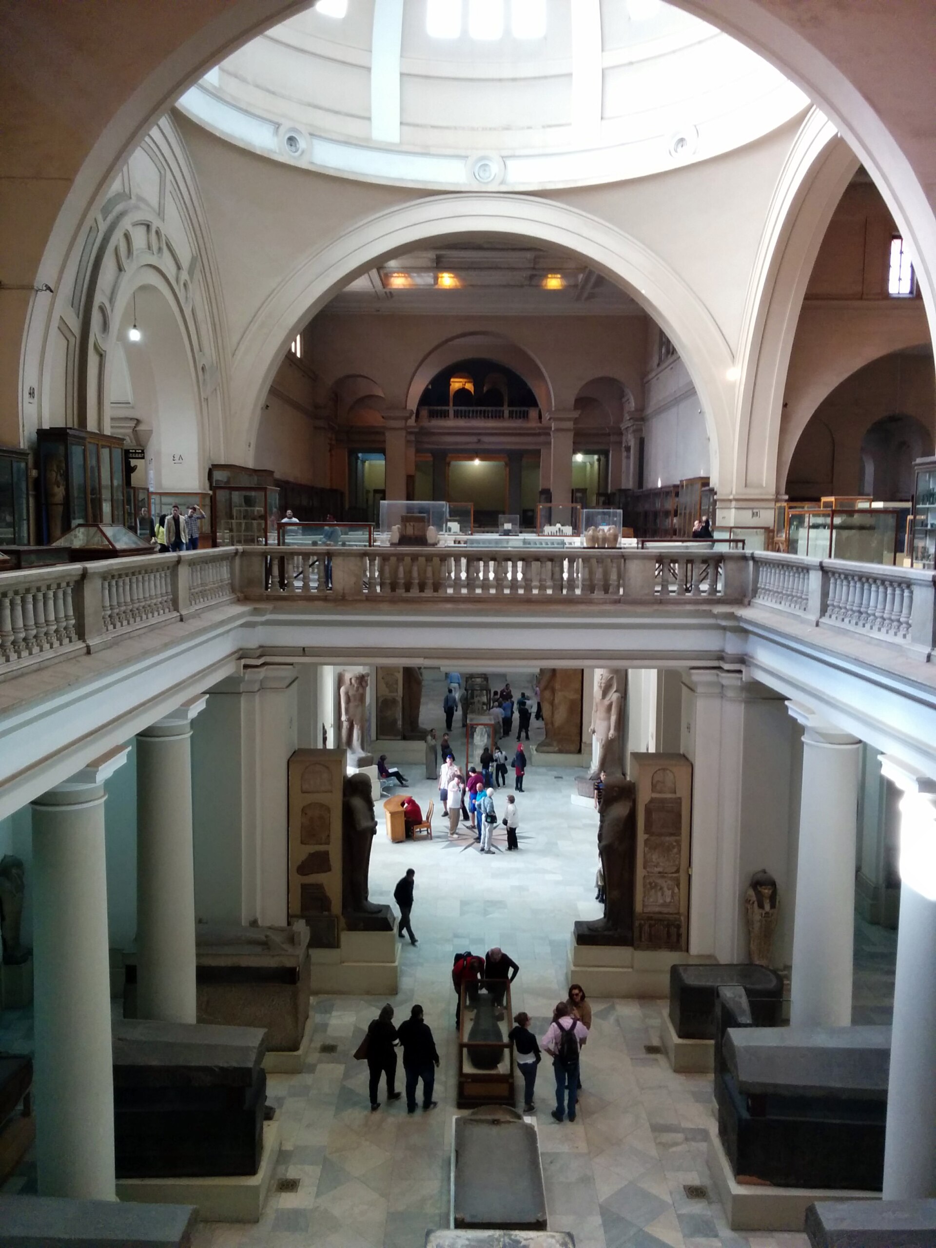 The two-storey atrium and great gallery, with colossal statuary and sarcophagi below and a balustraded gallery above