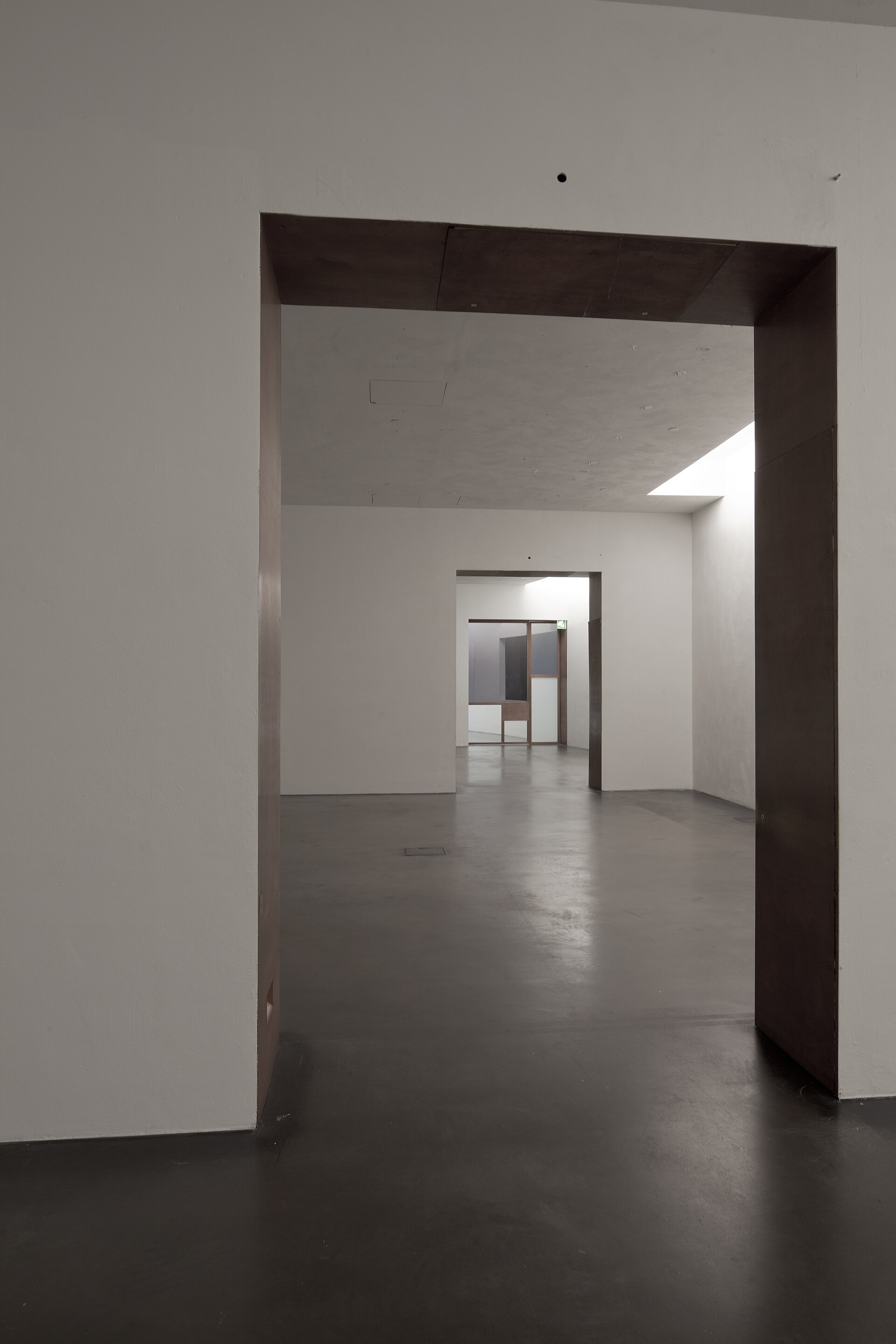 A white gallery space on Kiasma's second floor with artwork on the walls