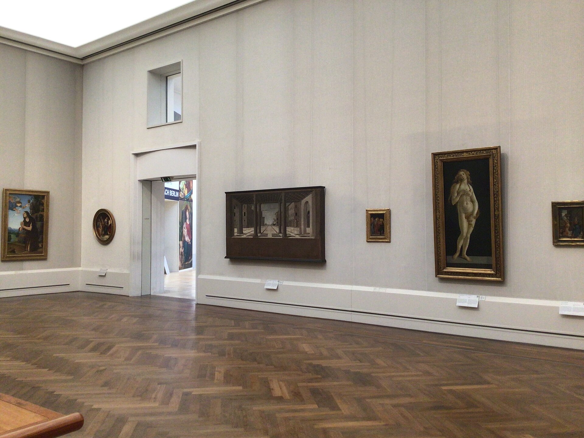The Italian Renaissance hall, with Botticelli's Venus and the Ideal City panel on one wall