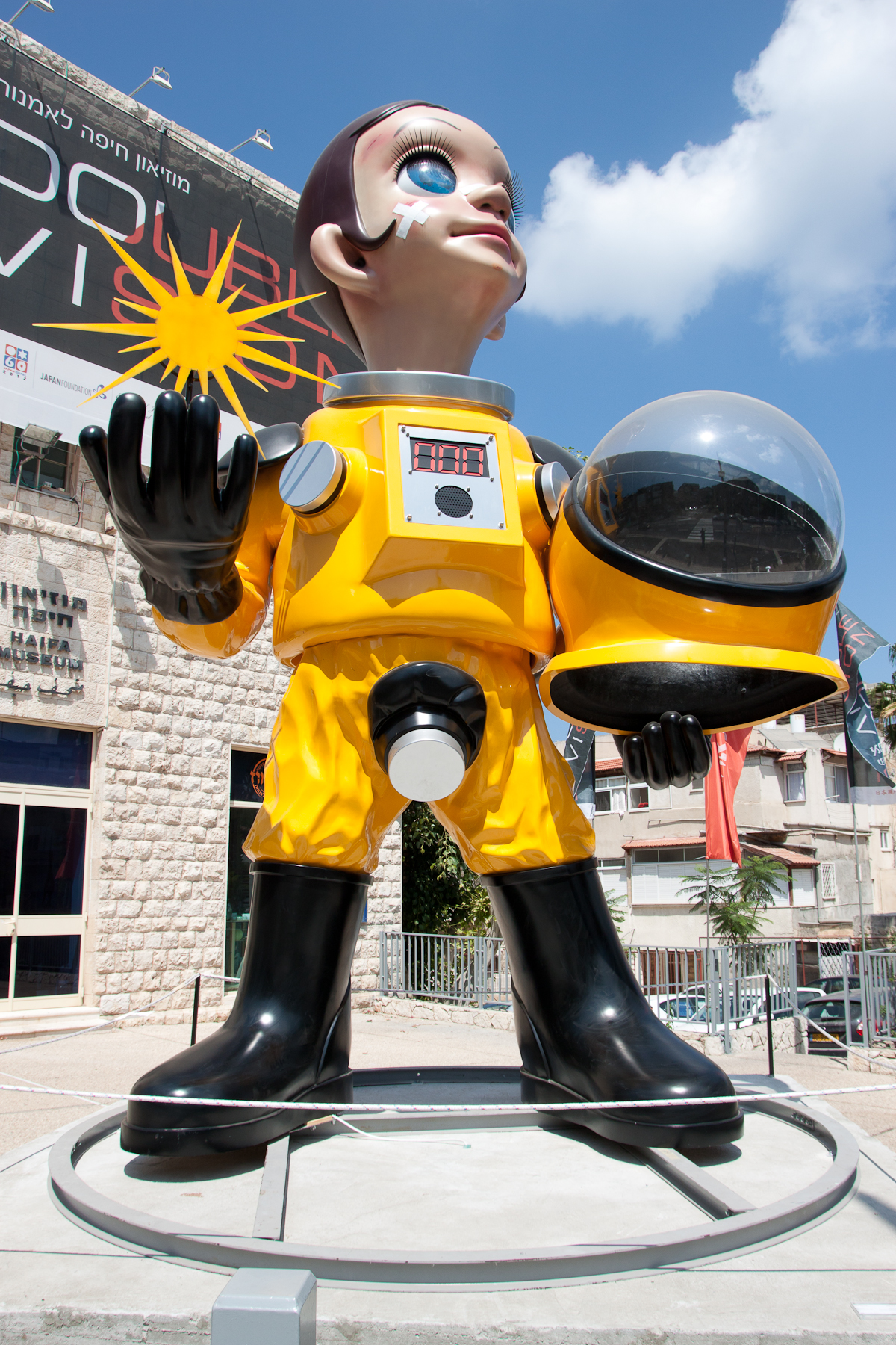 Kenji Yanobe's Sun Child outside the museum, 2012