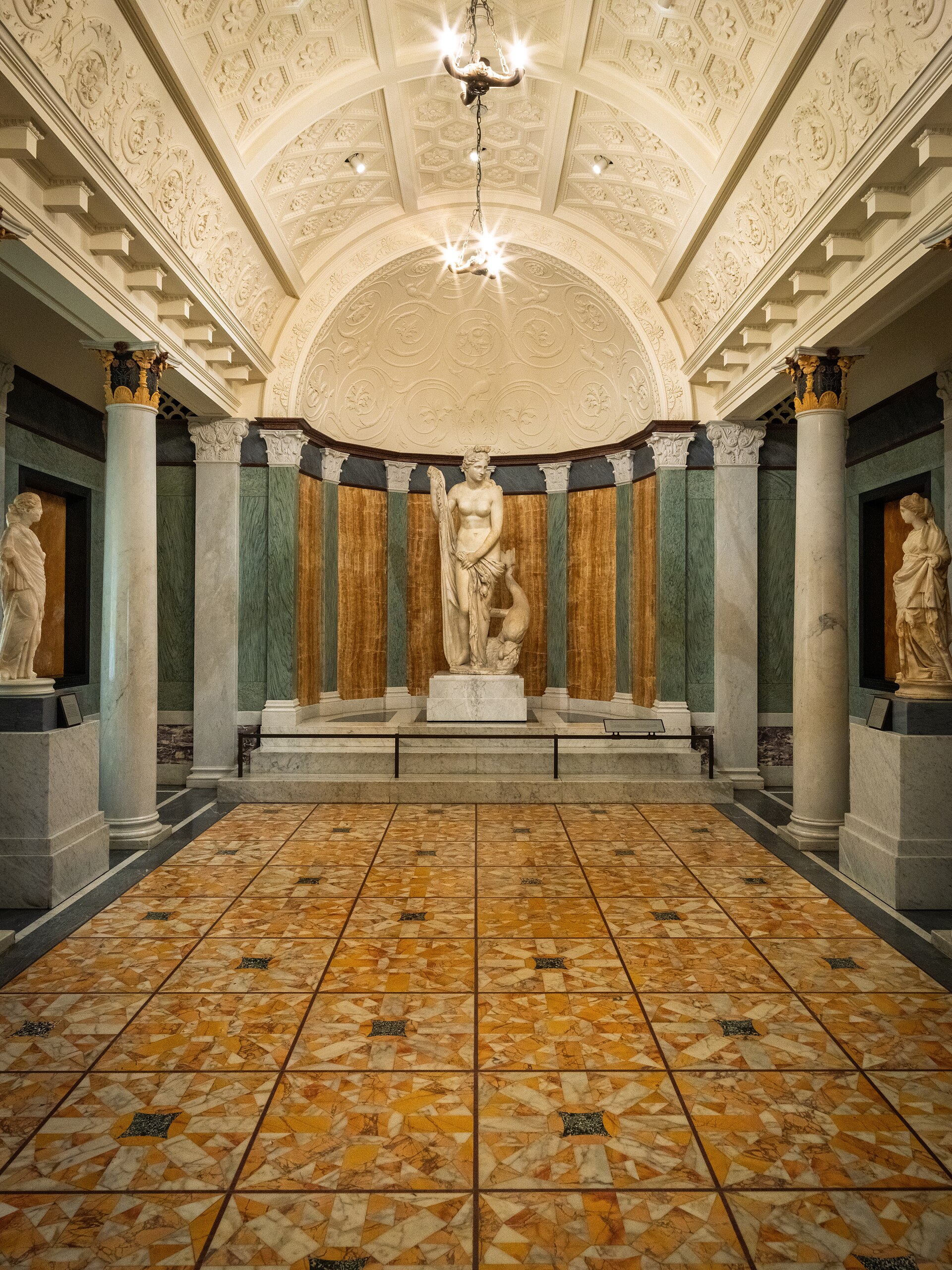A domed marble atrium gallery at the Getty Villa hung with ancient sculpture