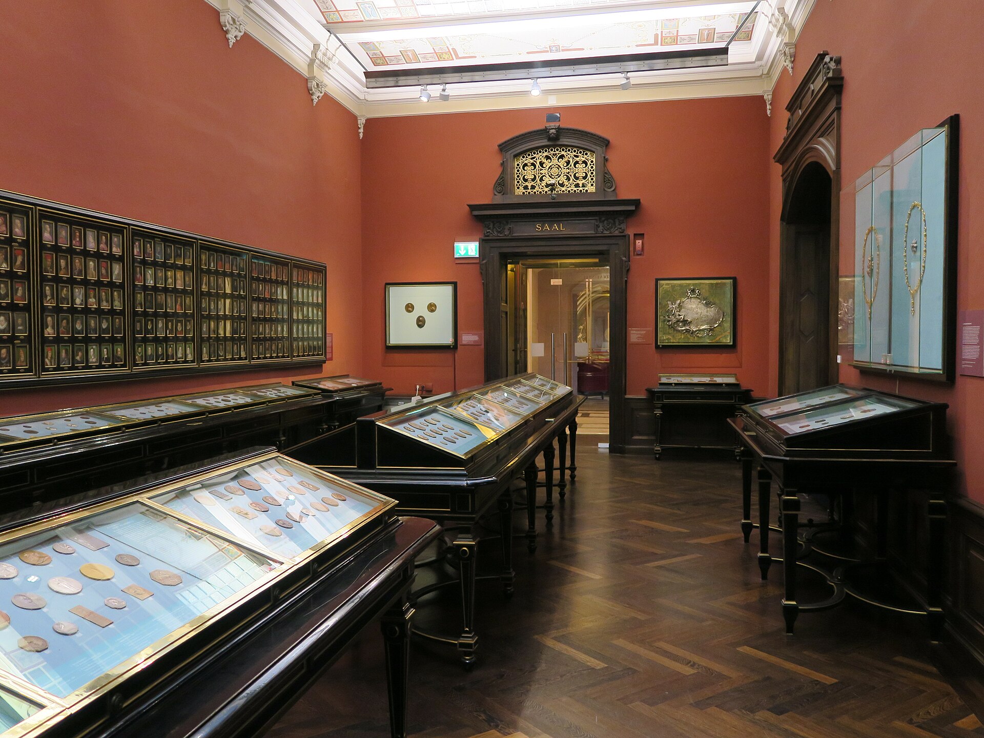The main room of the Coin Cabinet, rows of display tables