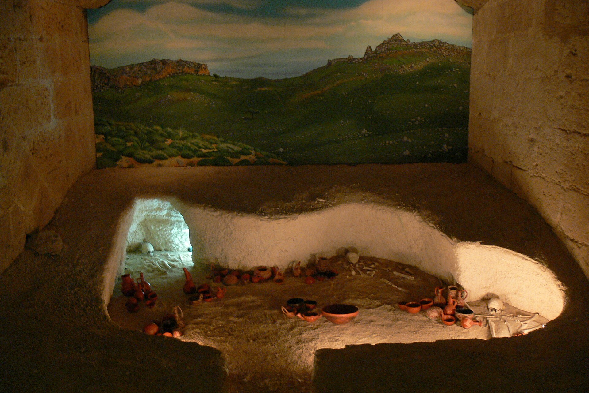 Reconstructed Bronze Age grave from Kirni, displayed inside Kyrenia Castle's archaeological gallery
