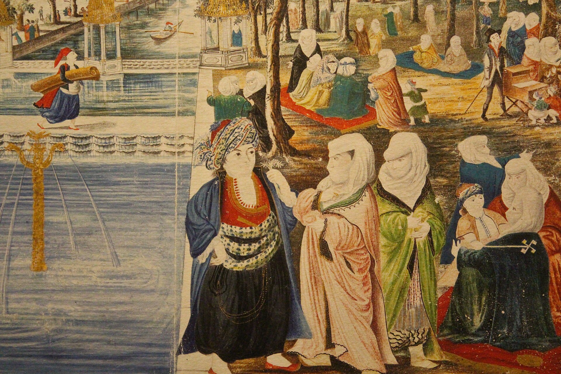 A Persian miniature painting depicting a garden scene, on display in the museum's Late Iranian Art gallery