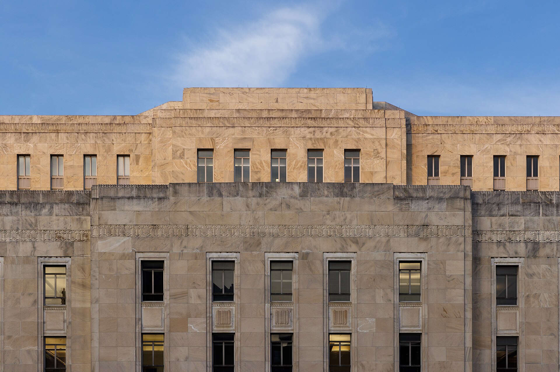 The limestone Art Deco facade of the John Adams Building