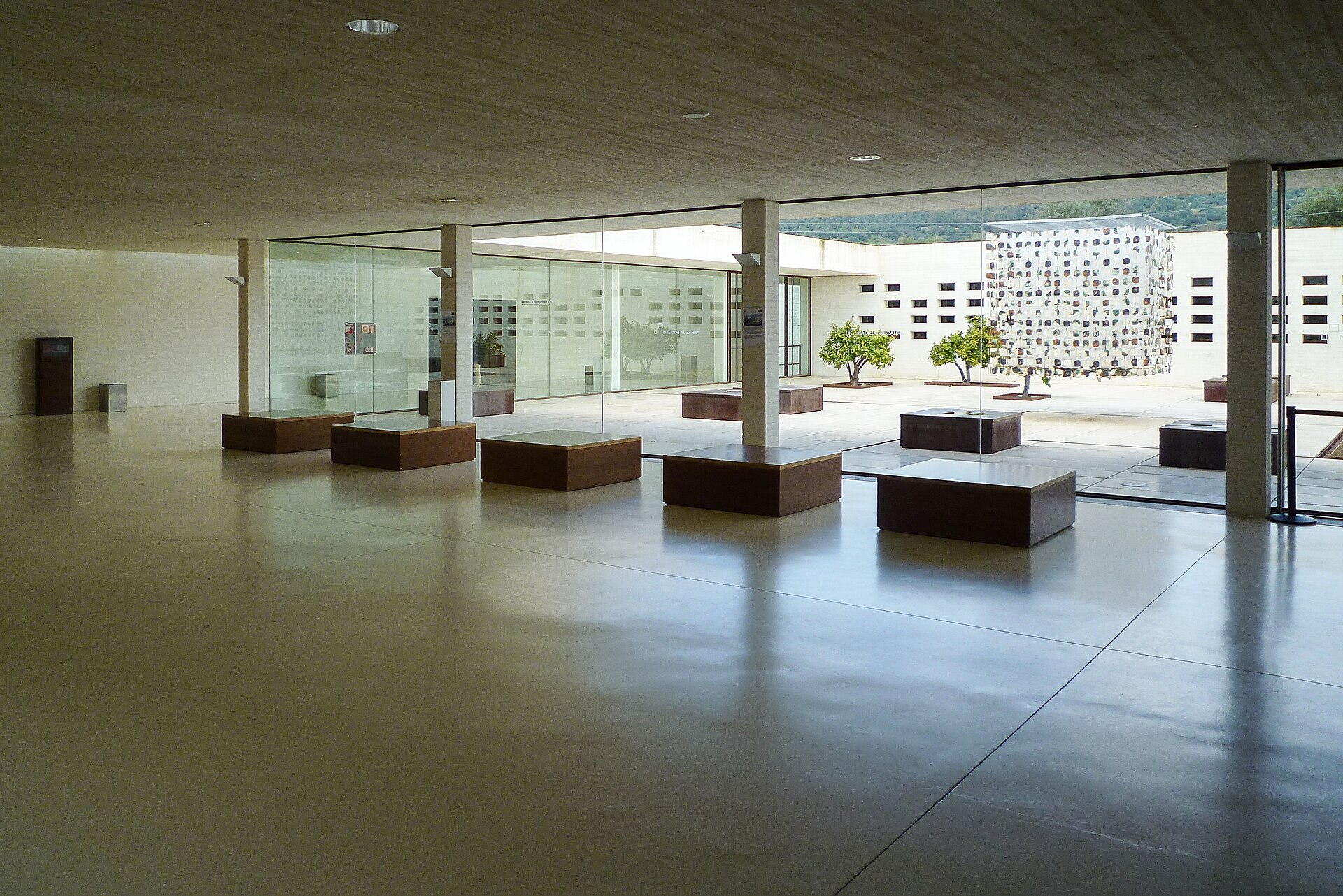 Interior courtyard of the Madinat al-Zahra museum, seen through glass from the entrance hall