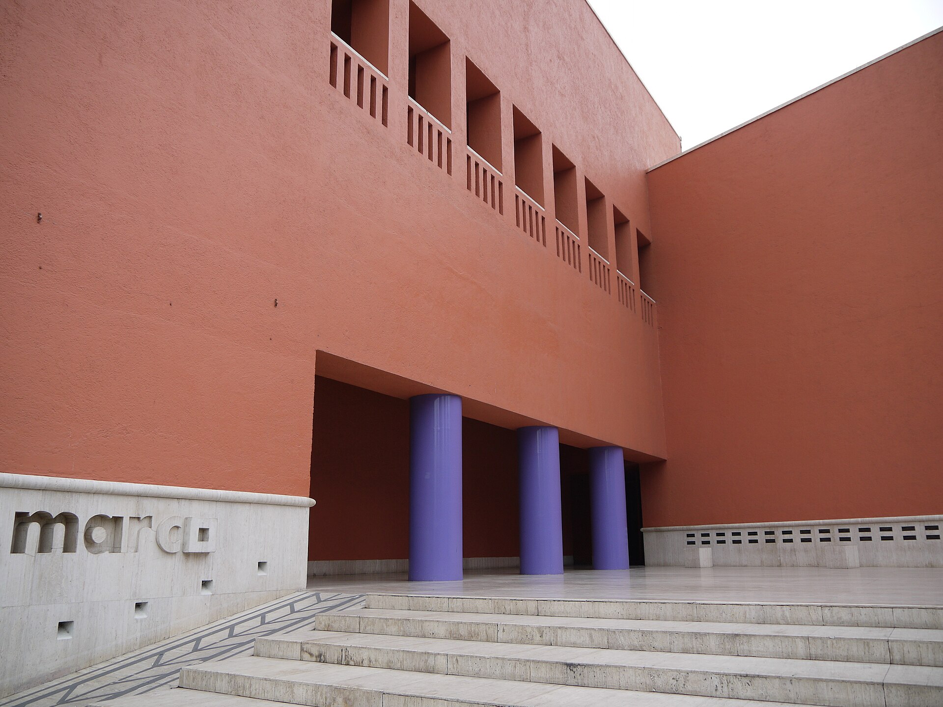 The entrance steps and purple columns