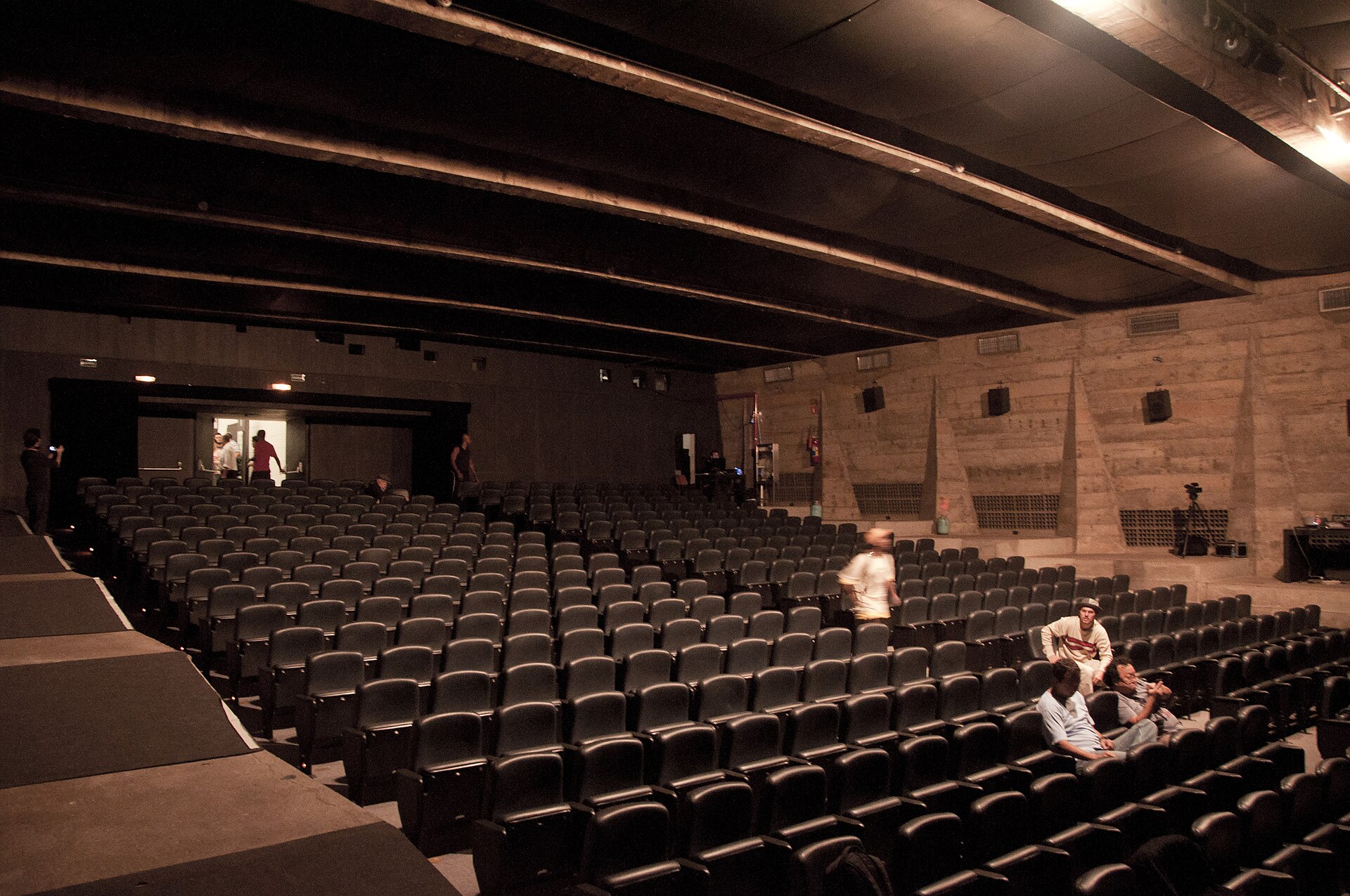 The MASP auditorium, raked seating against raw board-marked concrete walls