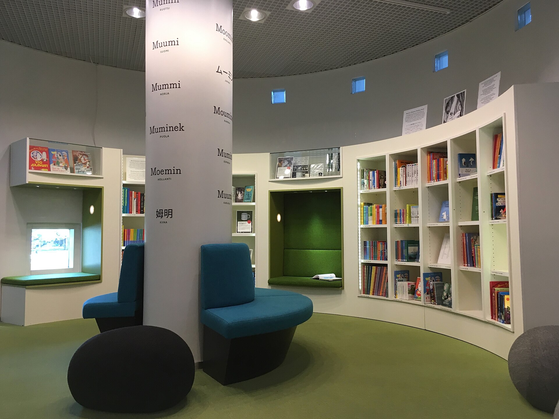 Shelves of Moomin books in many languages in the Moomin Museum's Reading Room in the Tampere Hall foyer