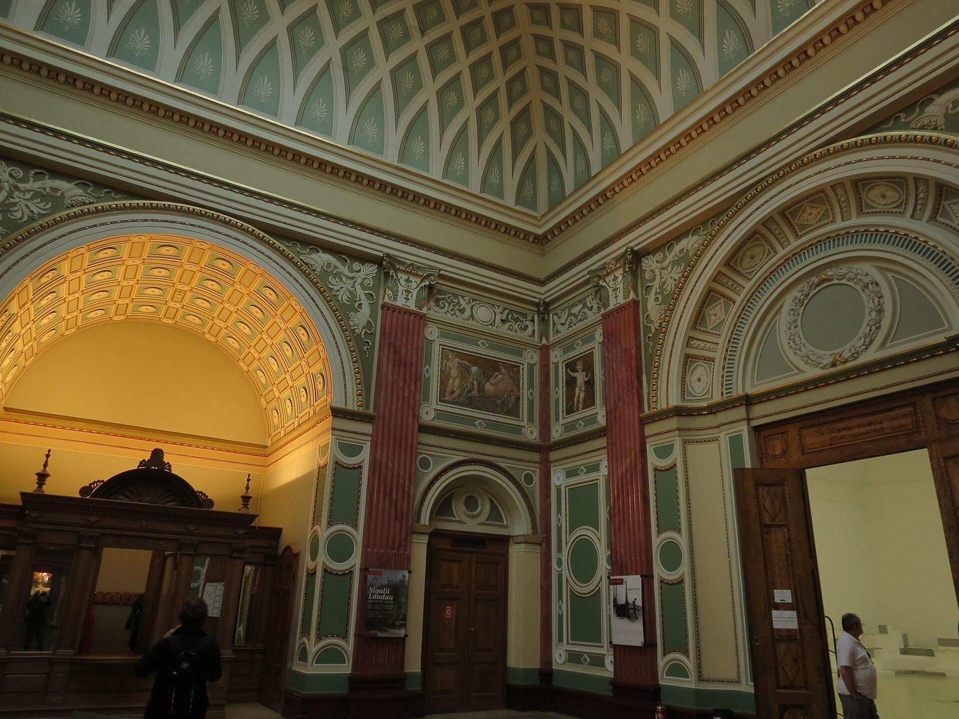 Interior of the main exhibition hall at Mucsarnok, Budapest, showing the skylit ceiling and gallery walls