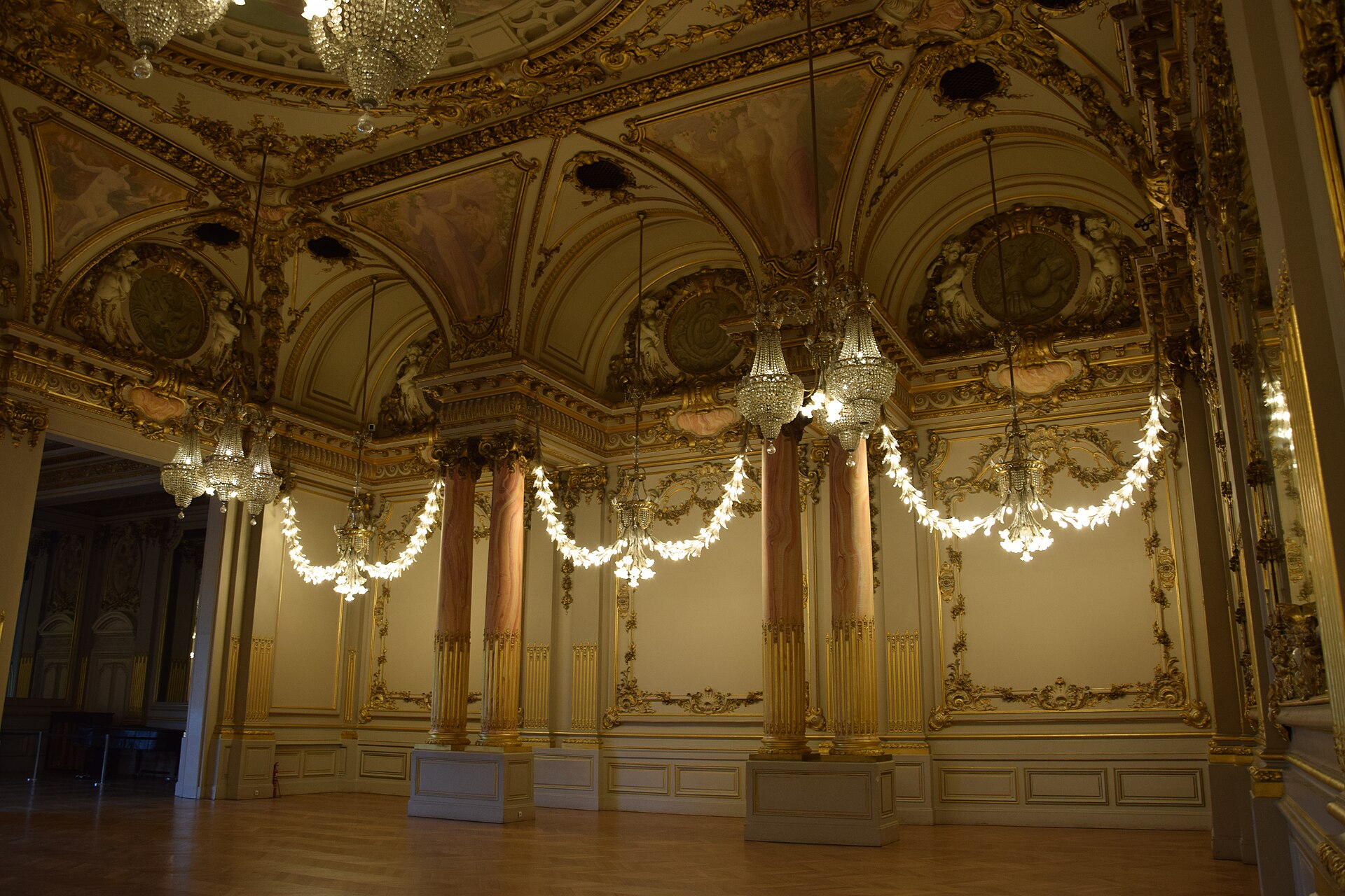 The gilded Salle des fetes, with its painted vault and marble columns