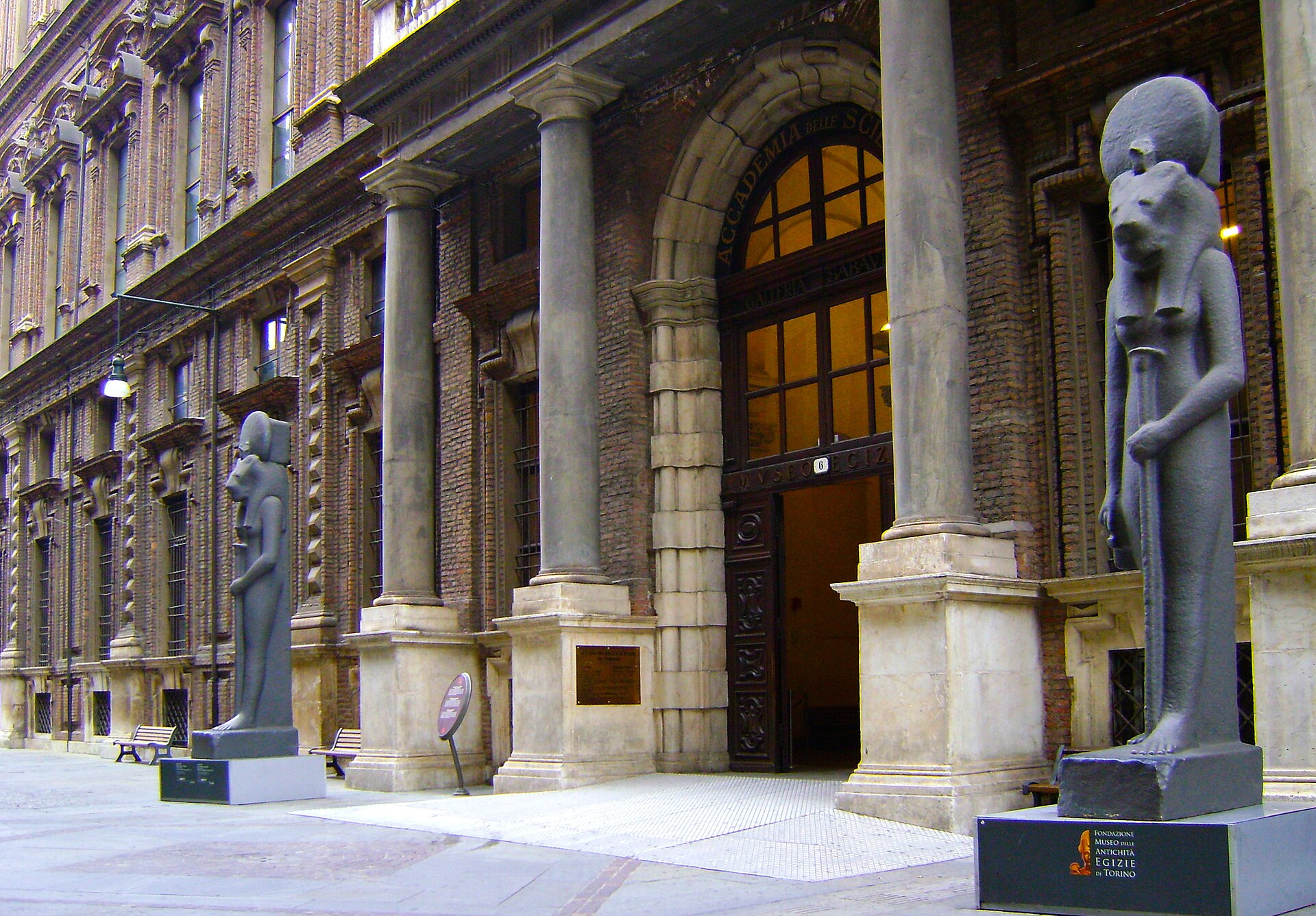 The colonnaded entrance, with its guardian statues
