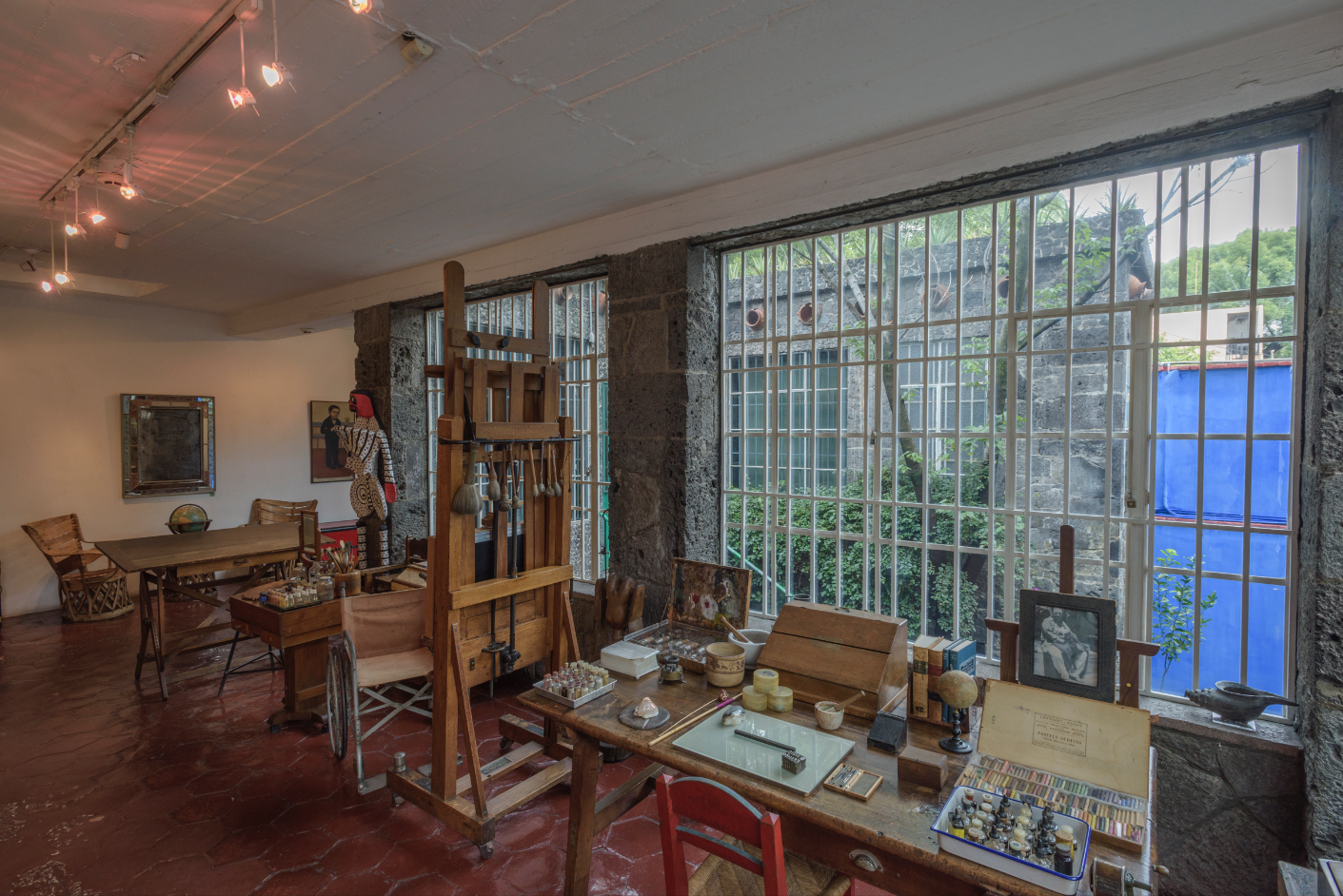 Frida Kahlo's studio at the Frida Kahlo Museum, with her easel and painting materials