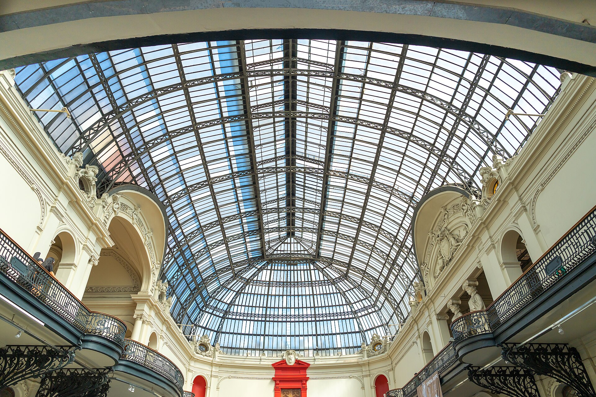 Looking up into the glass dome above the central hall of the museum