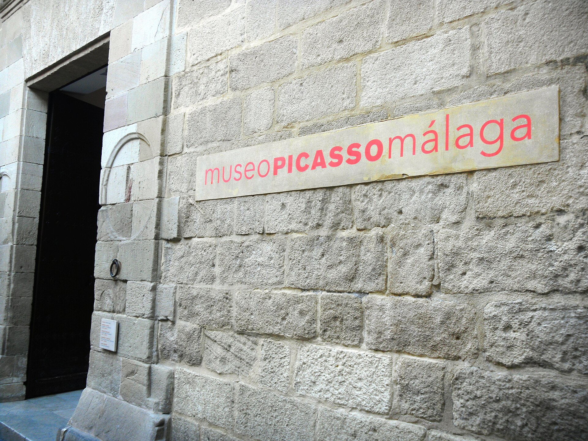 Museo Picasso Malaga signage on the palace wall