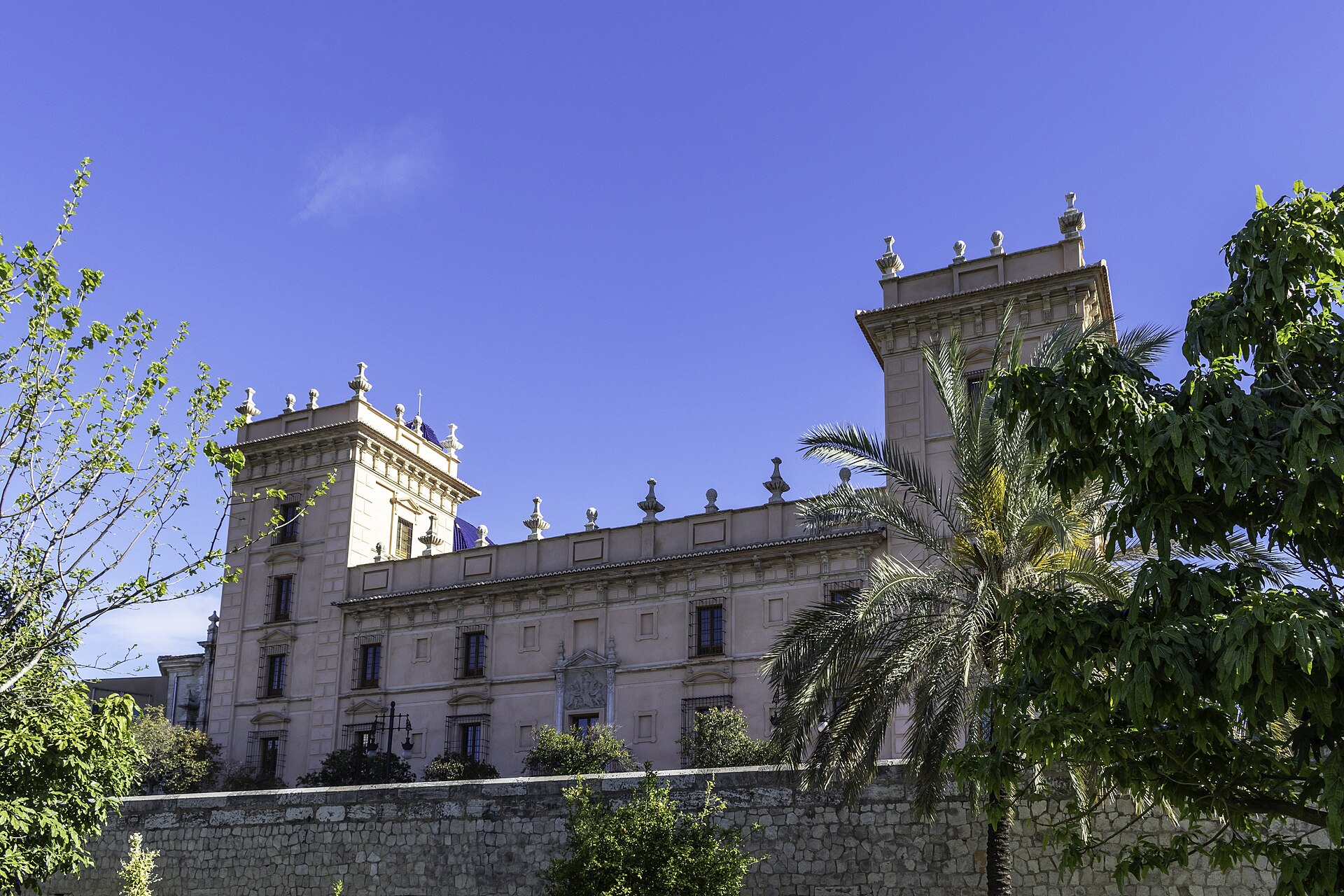 The towers and upper facade against a clear sky