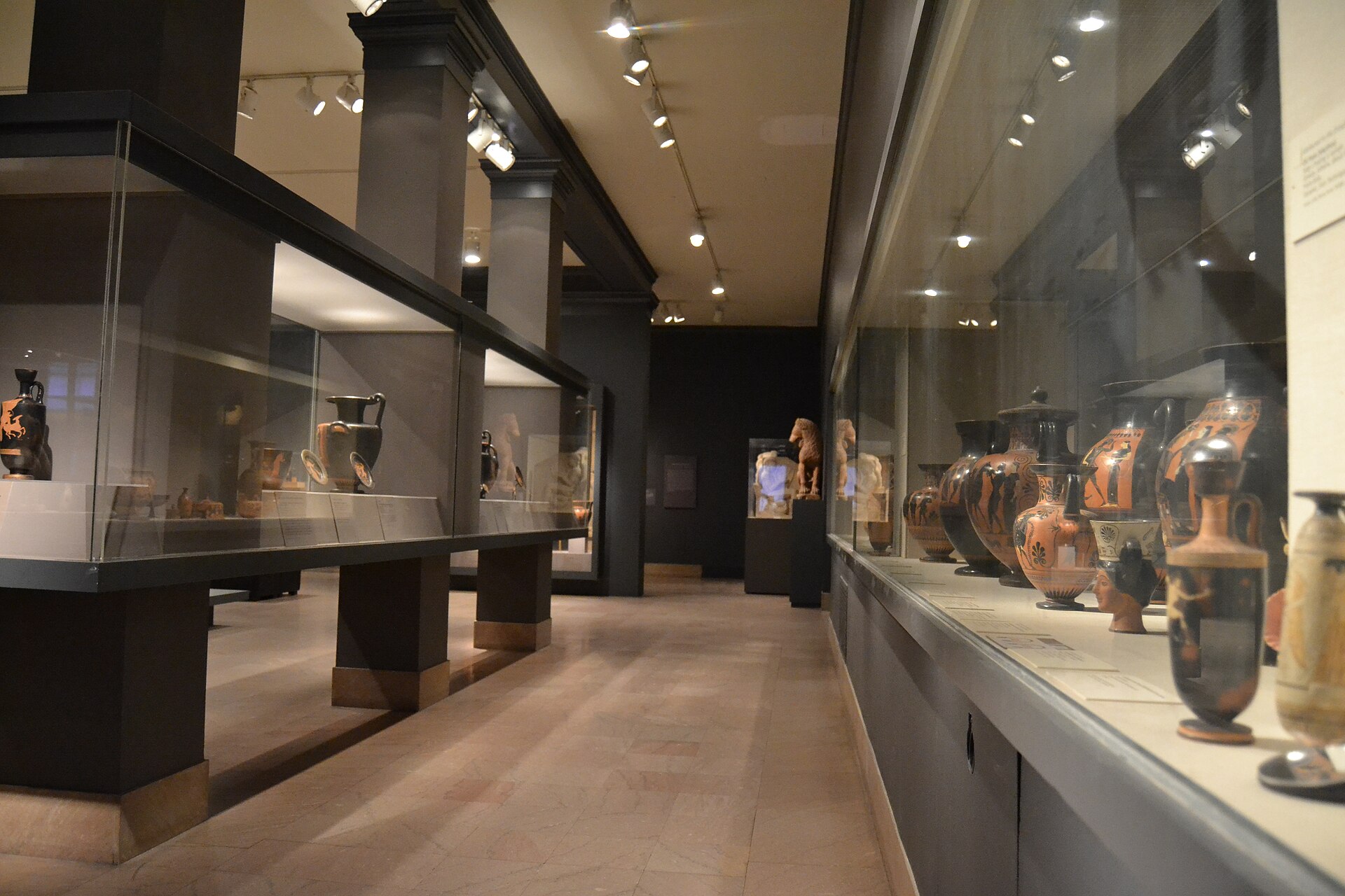 A corridor of Greek and Roman vase cases in the Behrakis Wing
