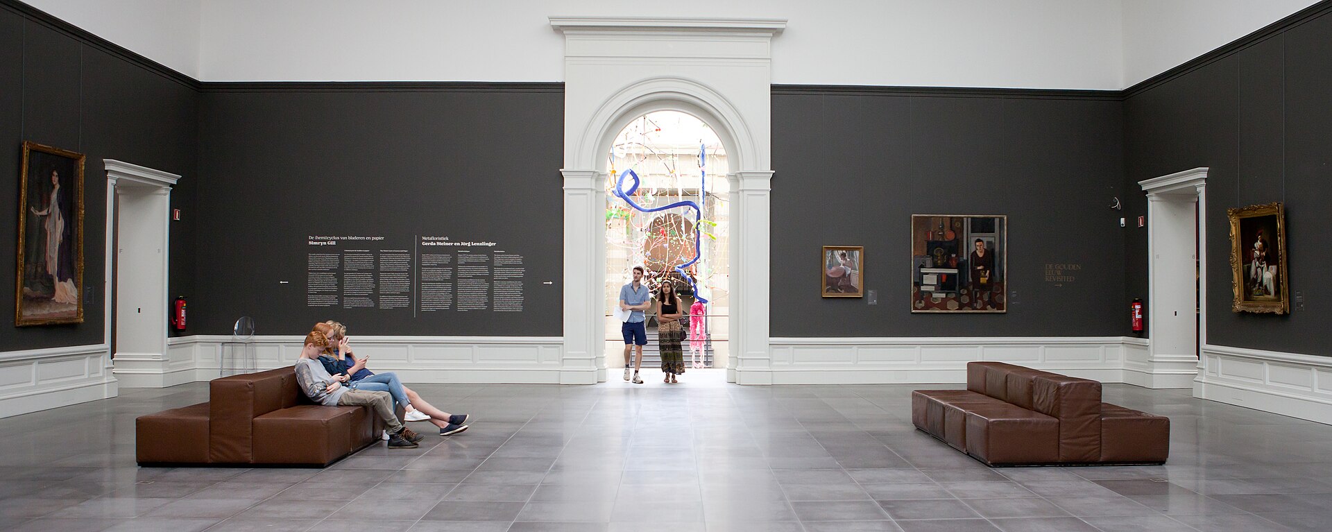 Picture gallery with courtyard beyond
