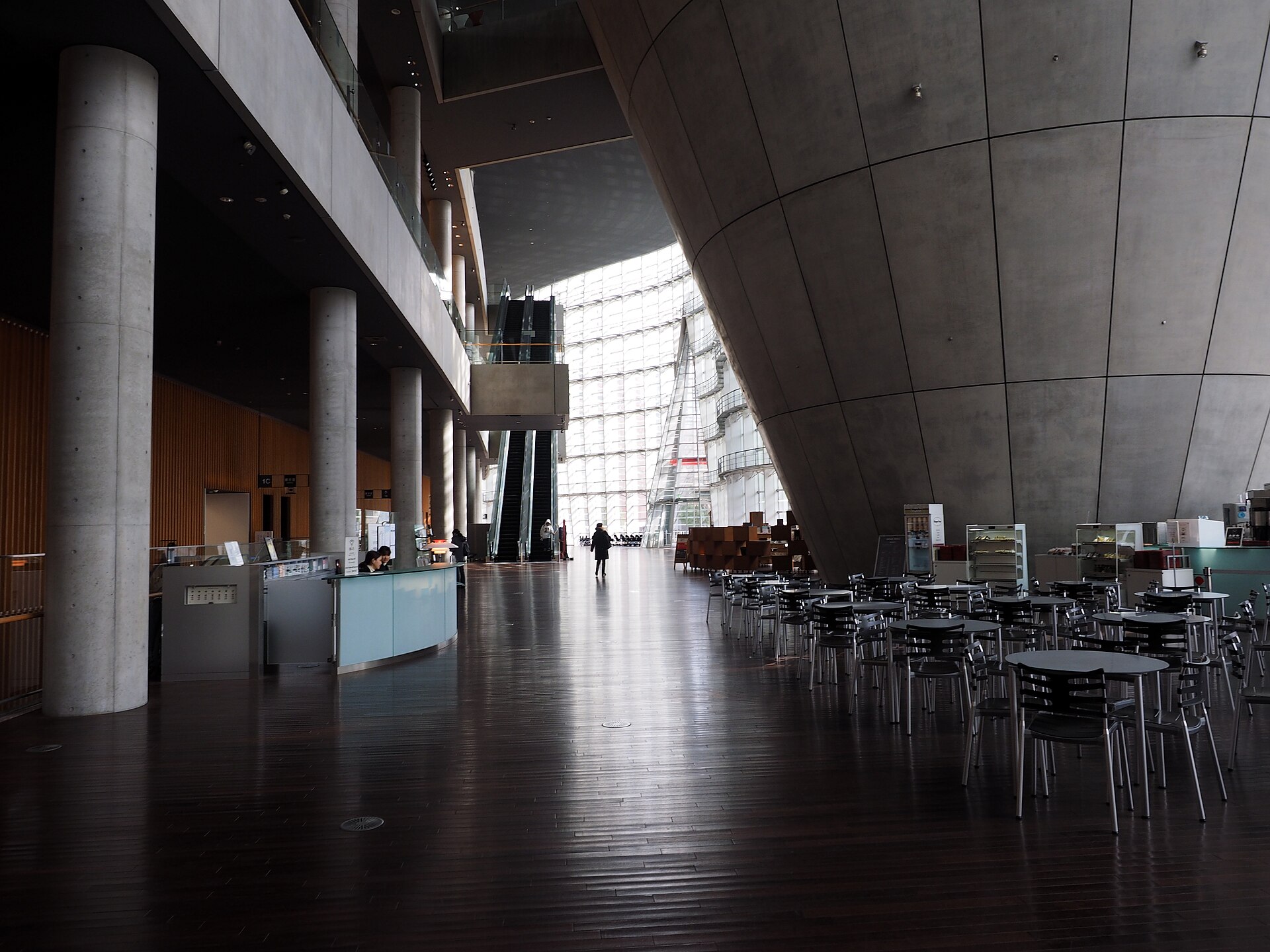 Inside the atrium, at the base of the larger cone
