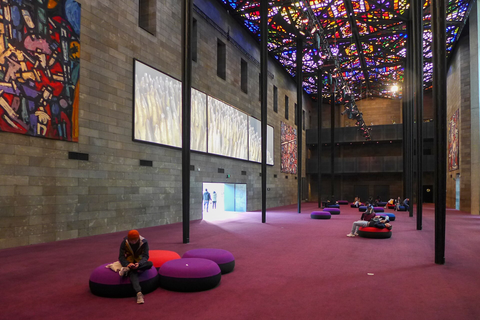 The Great Hall floor and walls under Leonard French's stained-glass ceiling