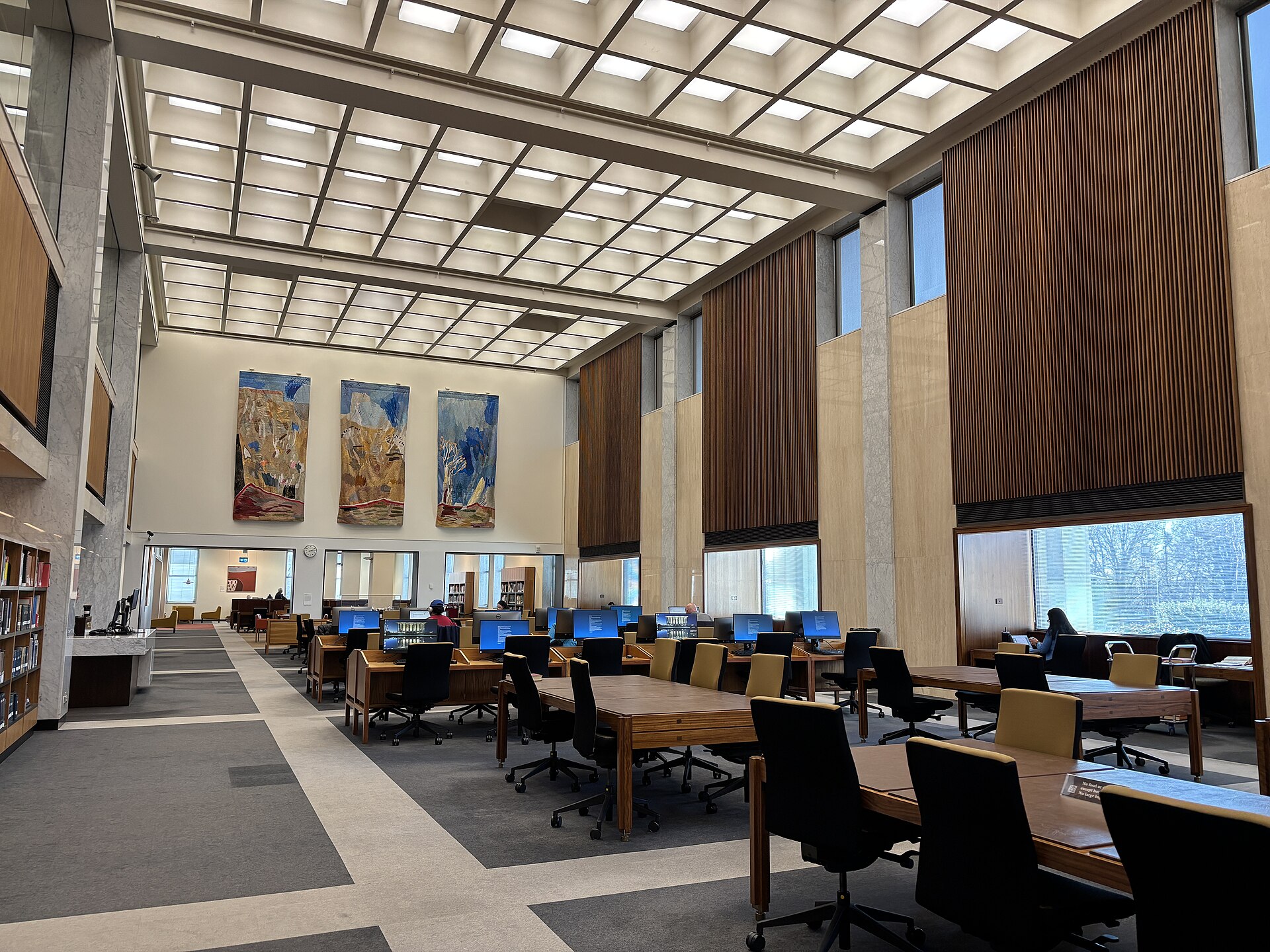 Reading desks under the vaulted ceiling of the Main Reading Room at the National Library of Australia
