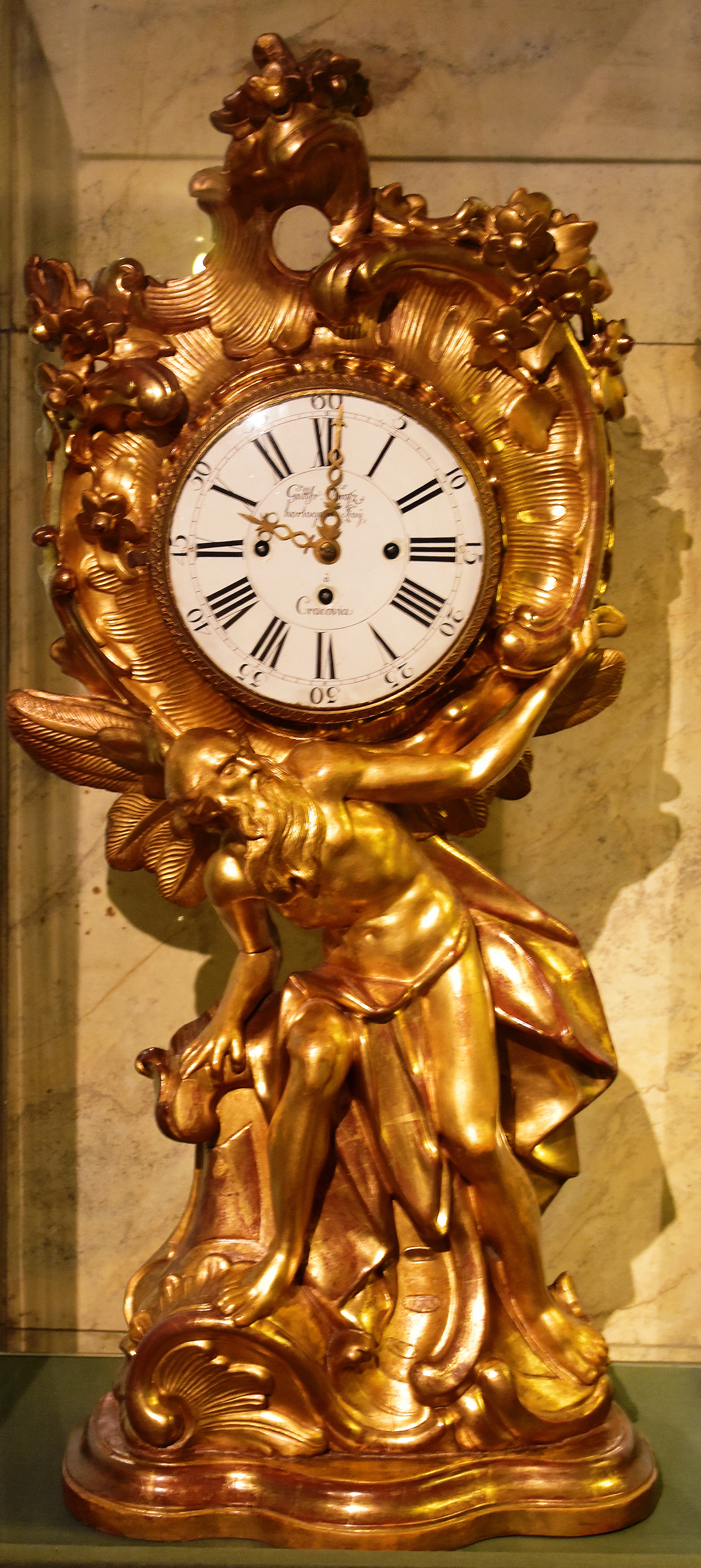 A gilded mantel clock in the Gallery of Artistic Crafts