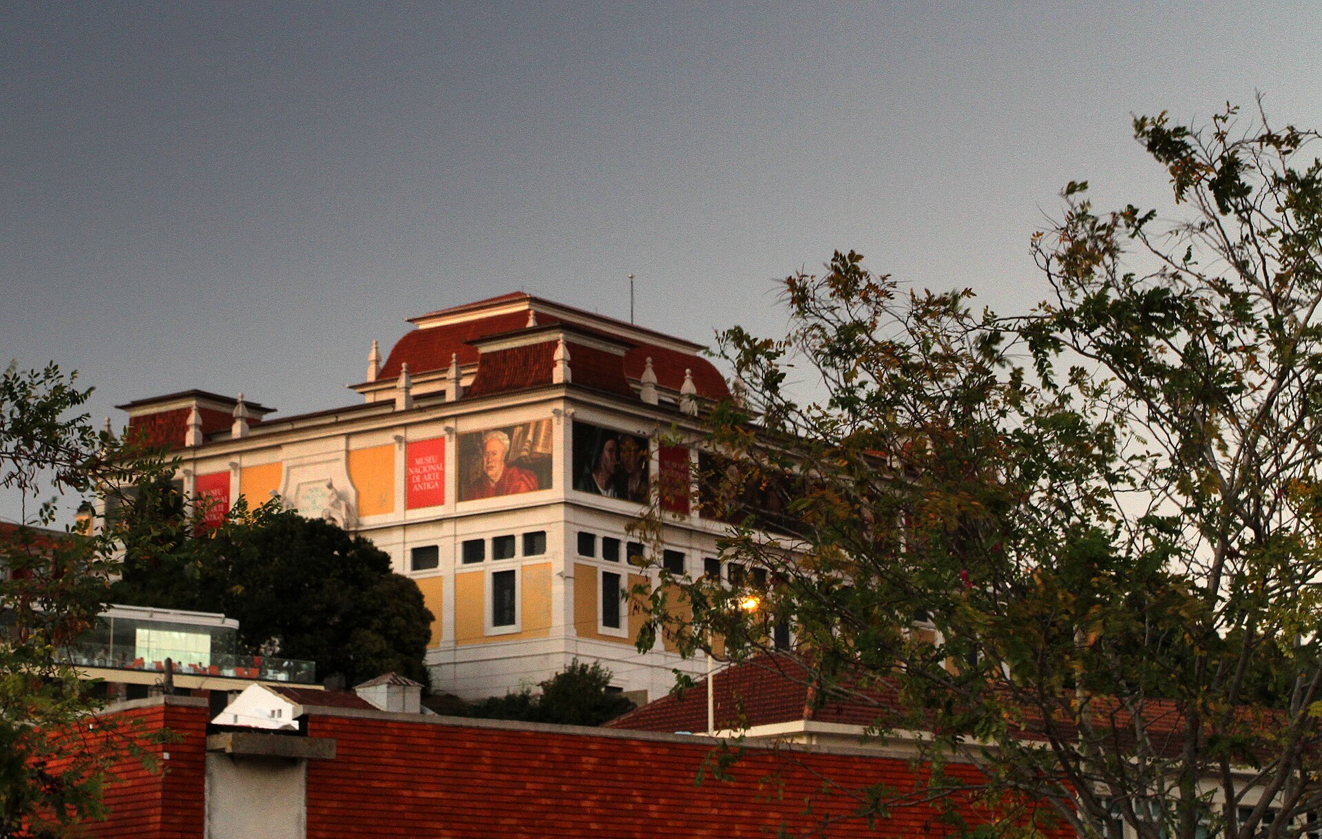 The museum seen through the surrounding trees