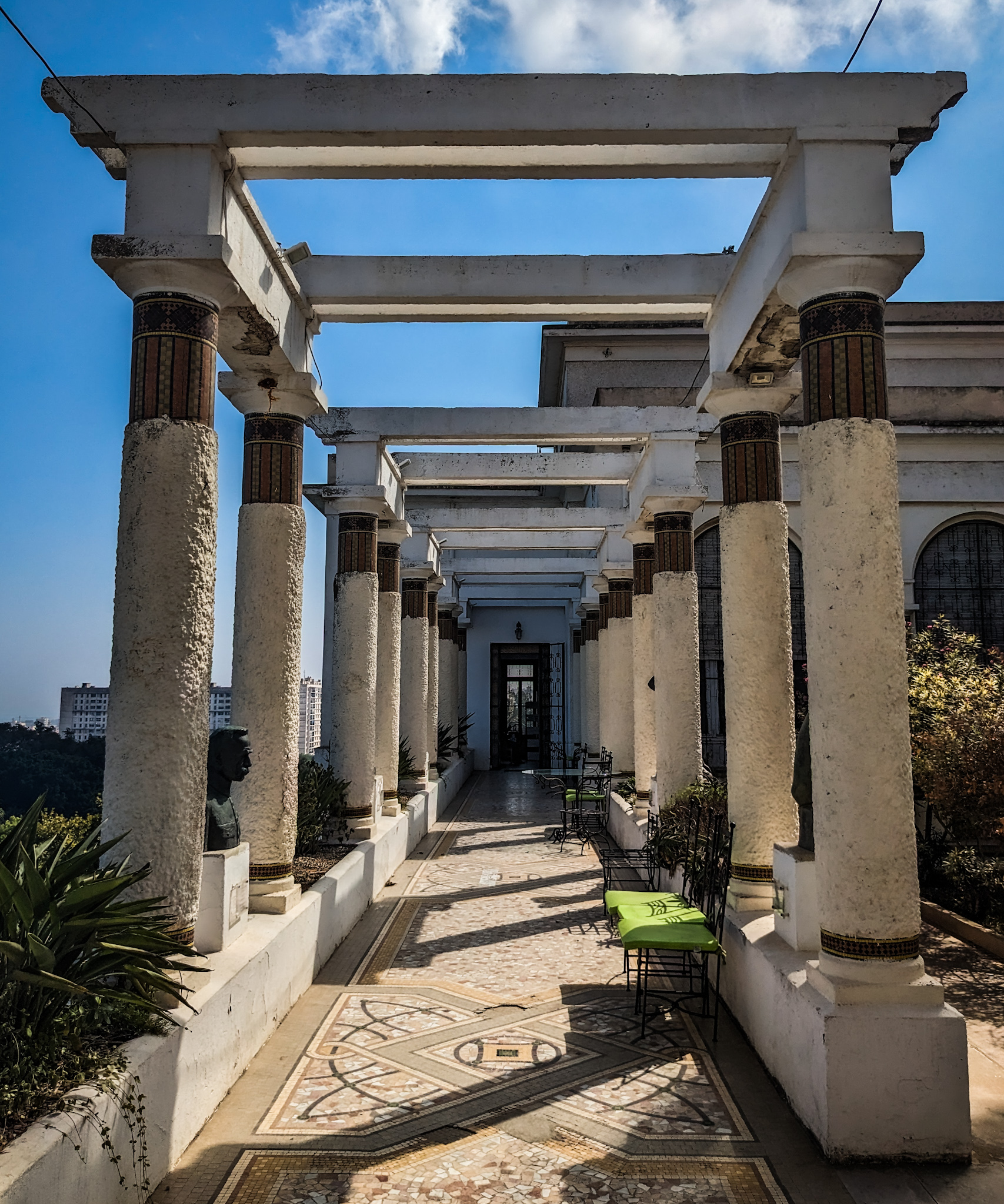 The terrace colonnade, with a portrait bust