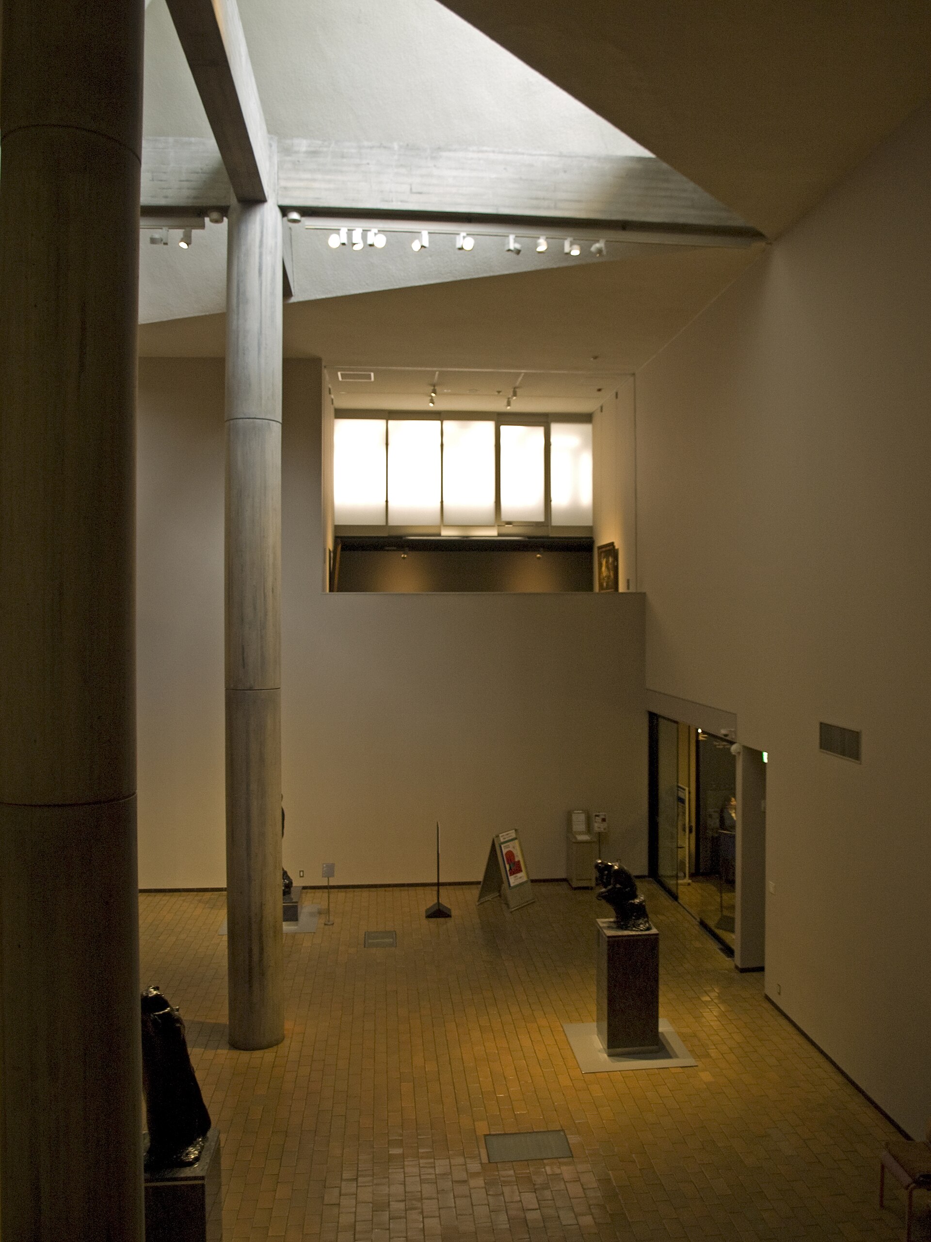 The double-height 19th Century Hall inside Le Corbusier's Main Building, lit by a clerestory window